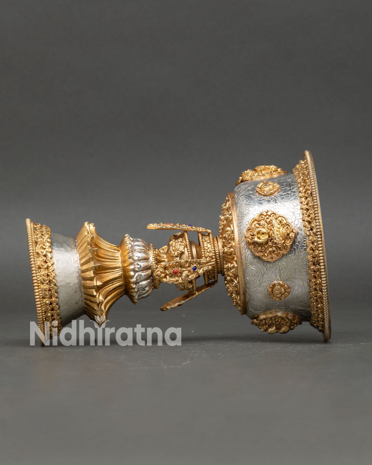 Buddhist butter lamp showing copper alloy body with gold and silver plated finish designed for altar use meditation rituals and spiritual offerings