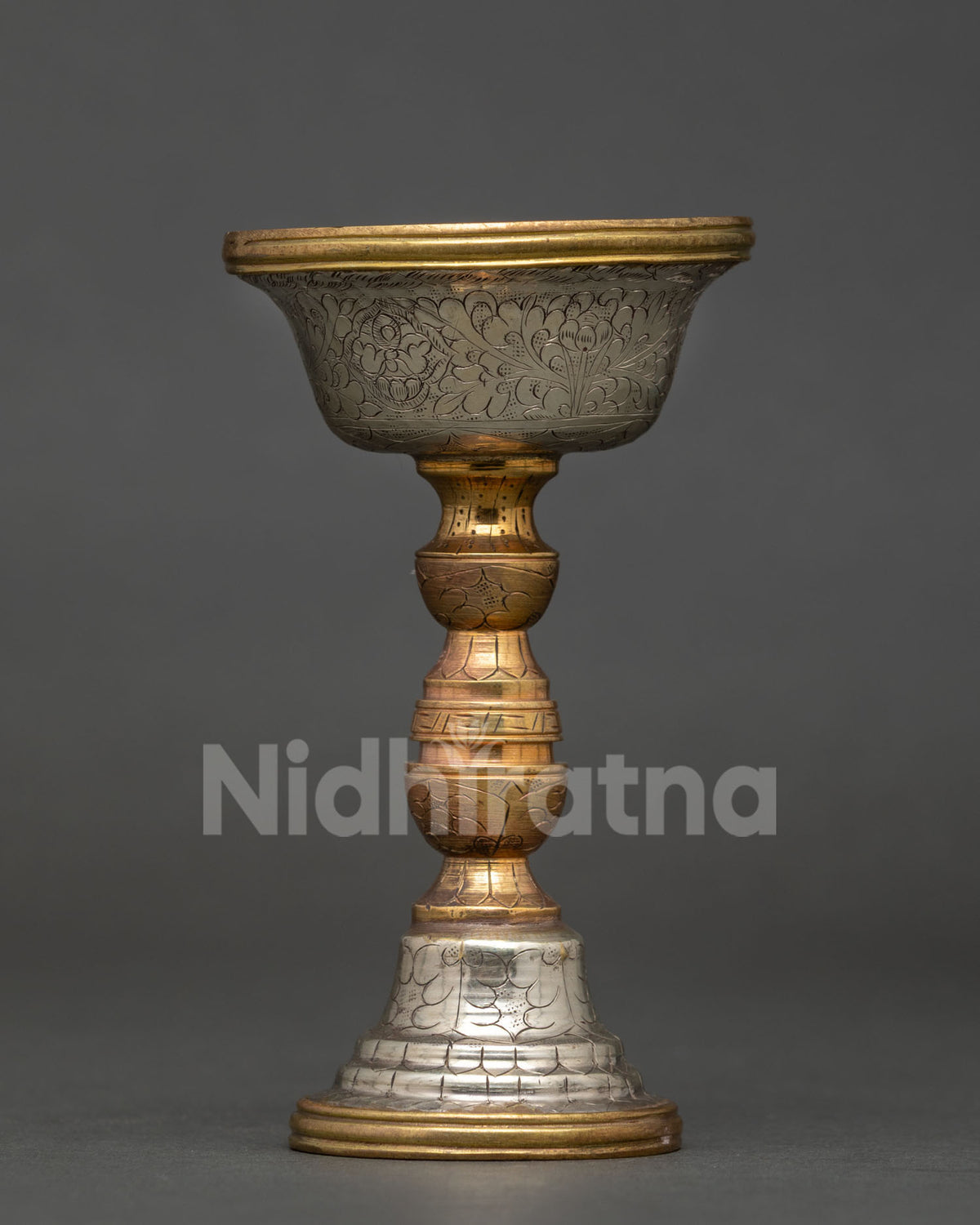 Buddhist Serkyem Offering Bowl made from copper with intricate floral motif carvings