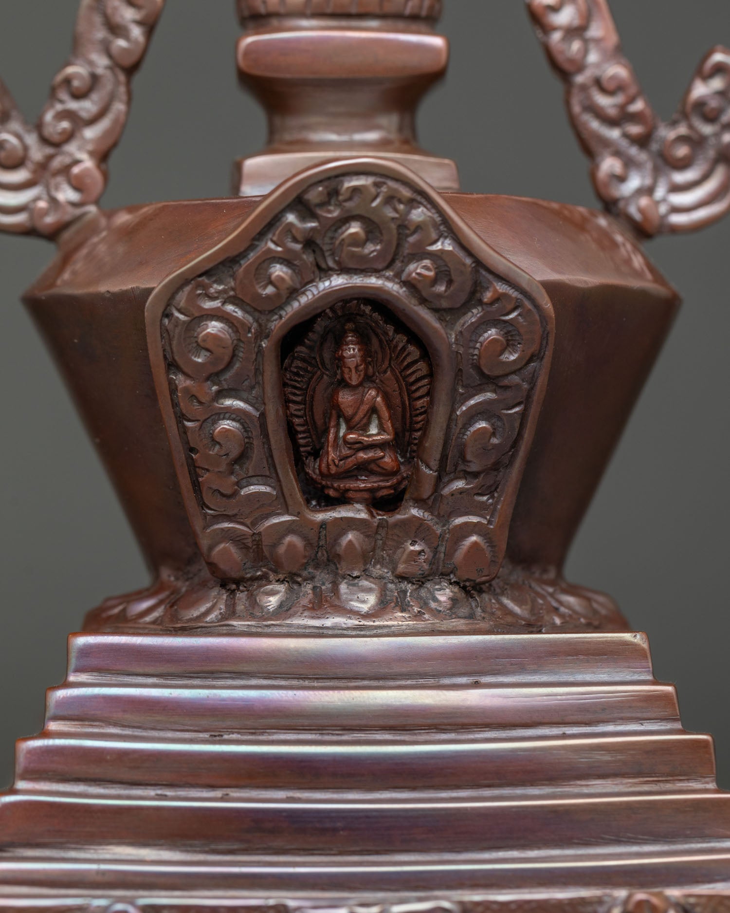 Buddhist Shakyamuni Stupa with miniature Buddha figure inside sacred monument