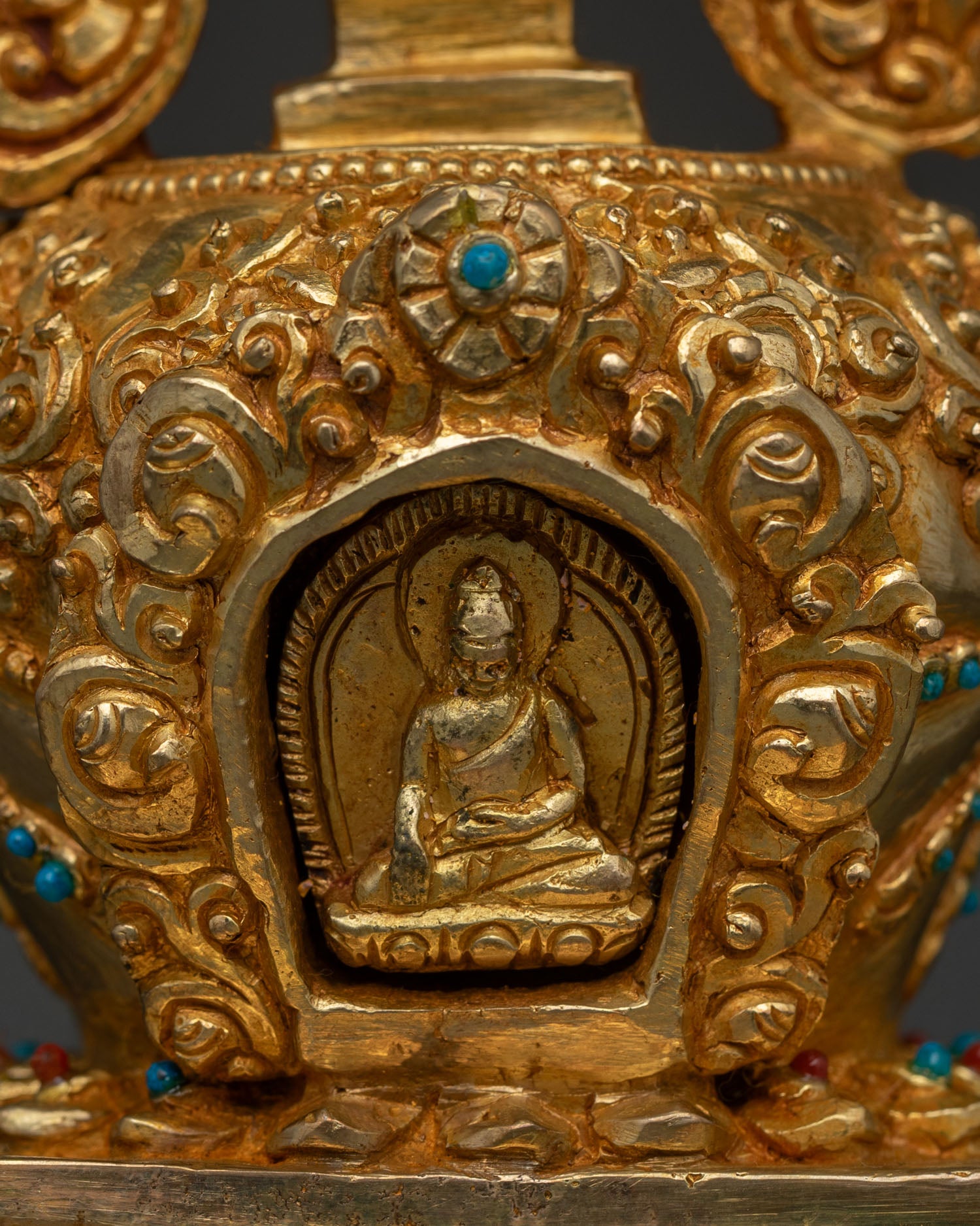 Buddhist stupa featuring miniature Siddhartha Gautama Shakyamuni Buddha figure