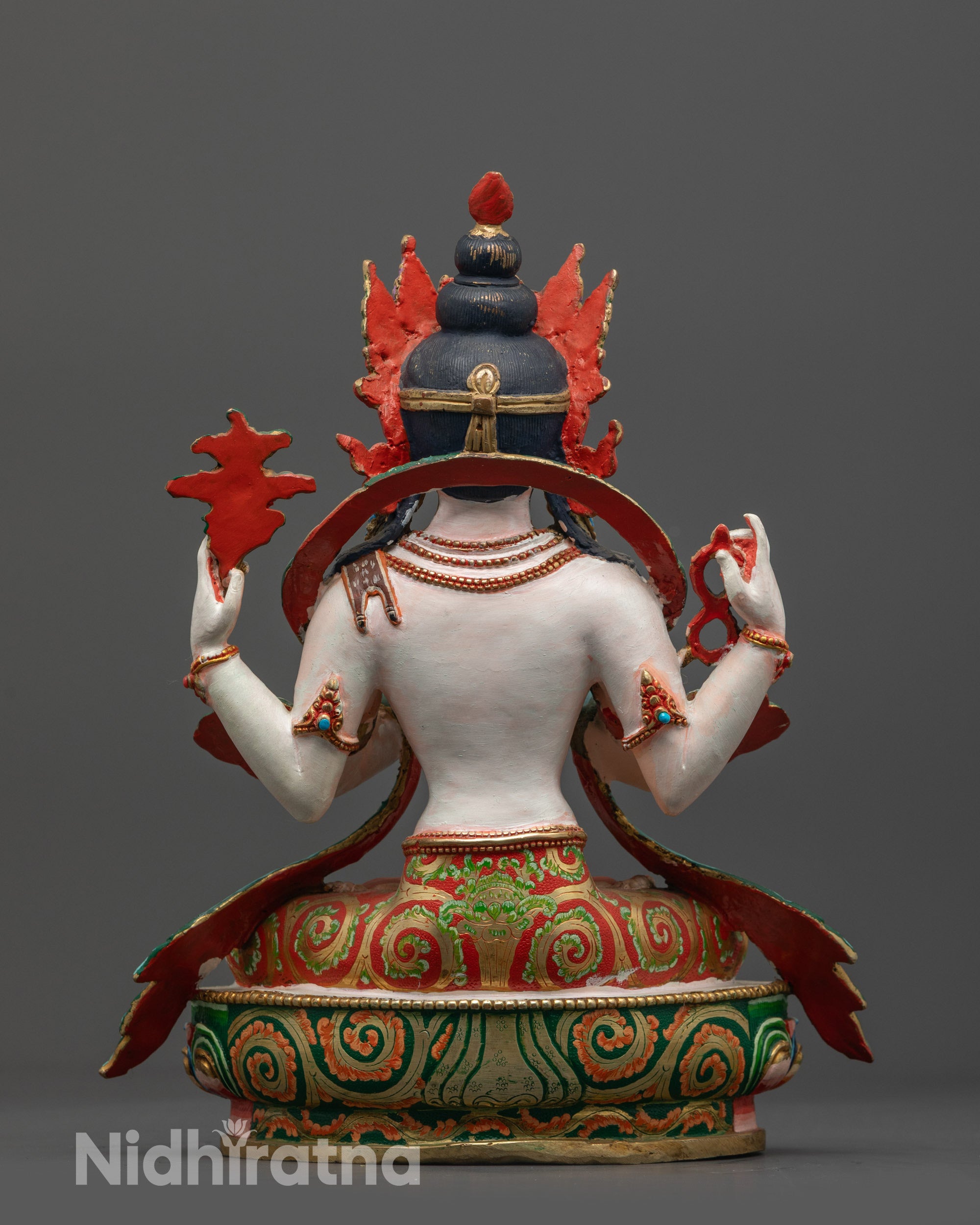Back view of Four-Armed Avalokiteshvara statue showing intricate hand-painted details and colors