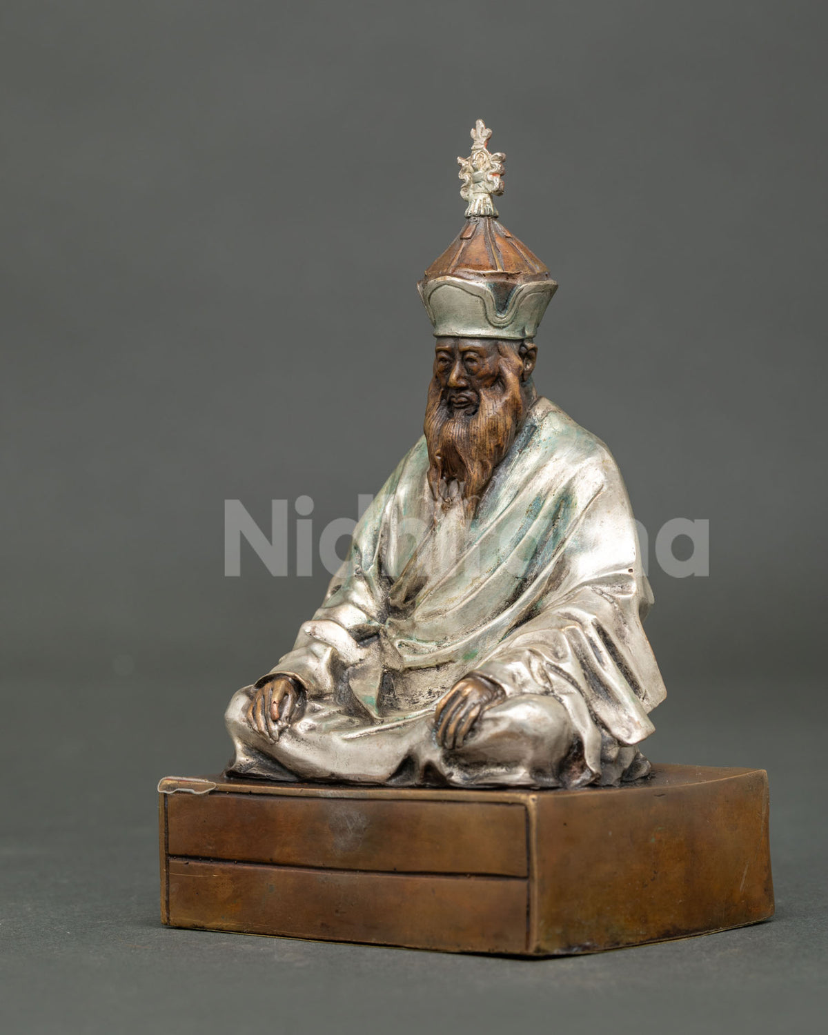 Chatral Rinpoche statue hand carved monastic robes on ornate throne.