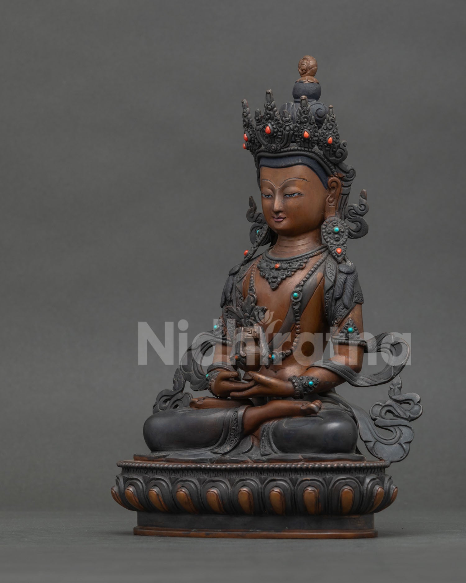 Chemically oxidized Amitayus Statue with acrylic painted copper finish.