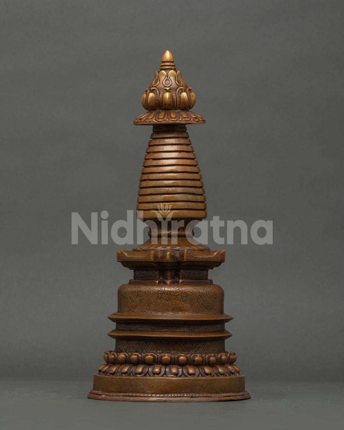 Chemically oxidized Kadampa Stupa with stepped harmika for Buddhist altar and meditation space.