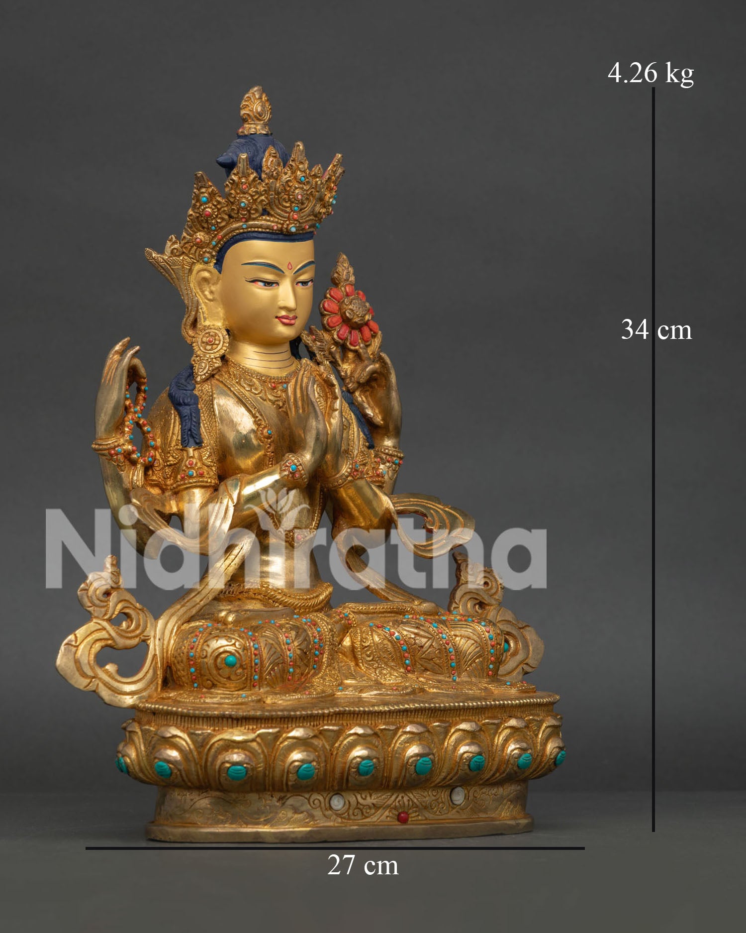 Chenrezig Avalokiteshvara Statue seated on lotus pedestal with four arms holding sacred objects
