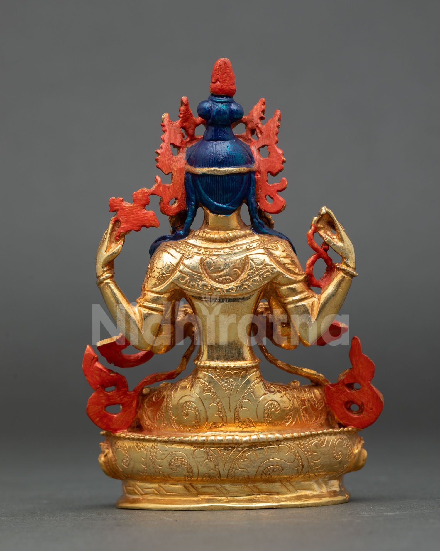 Chenrezig statue back view Tibetan sculpture copper gold finish engraved lotus base details