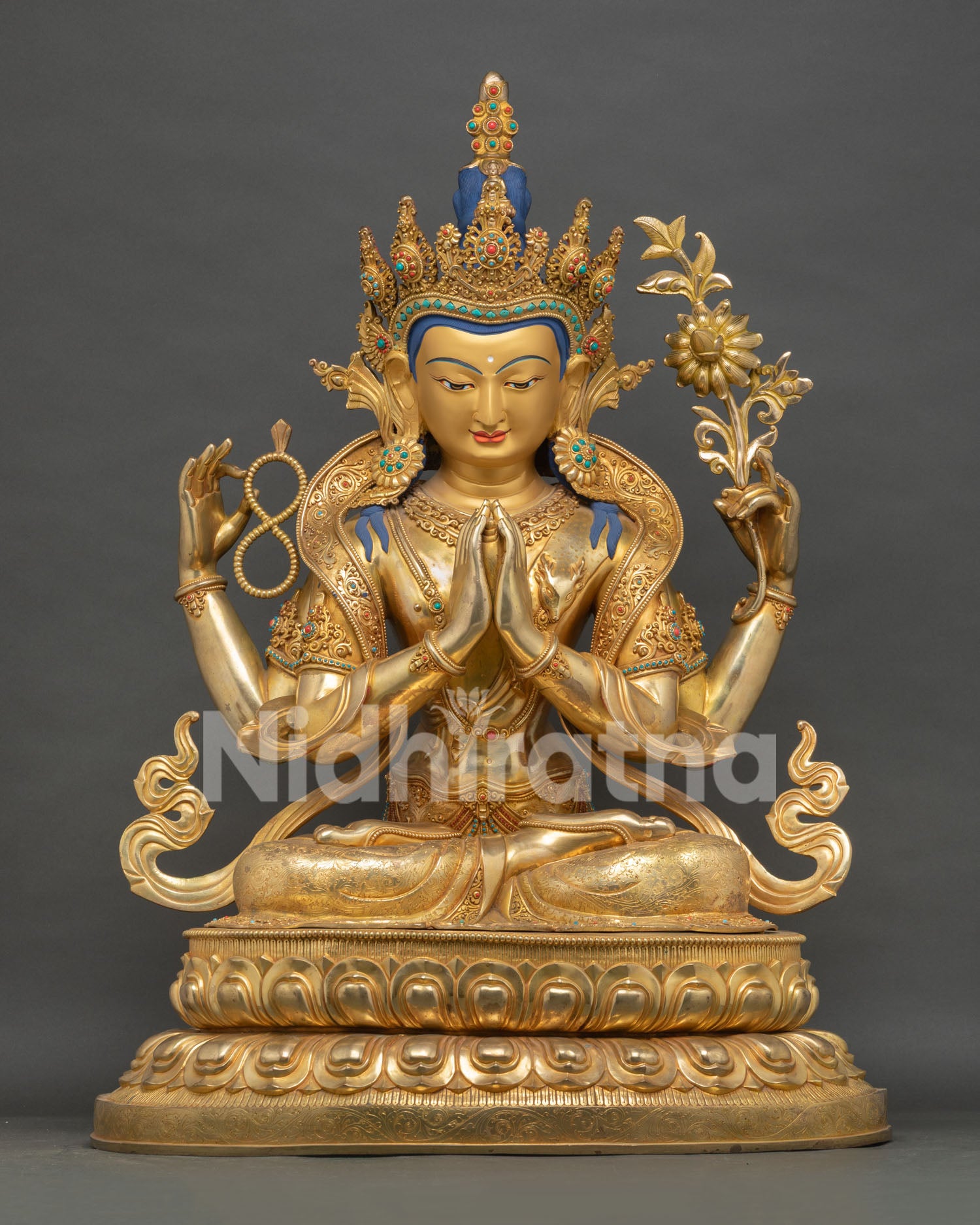 Chenrezig statue copper gold gilded avalokiteshvara seated lotus pedestal full view
