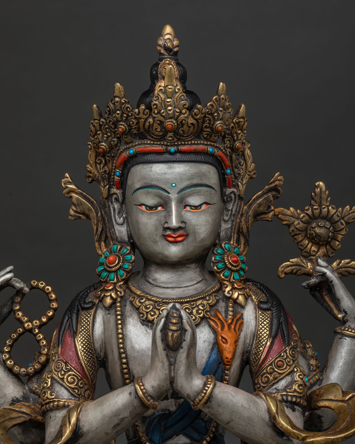 Chenrezig Statue Face Close Up with Amitabha Crown and Compassionate Expression.