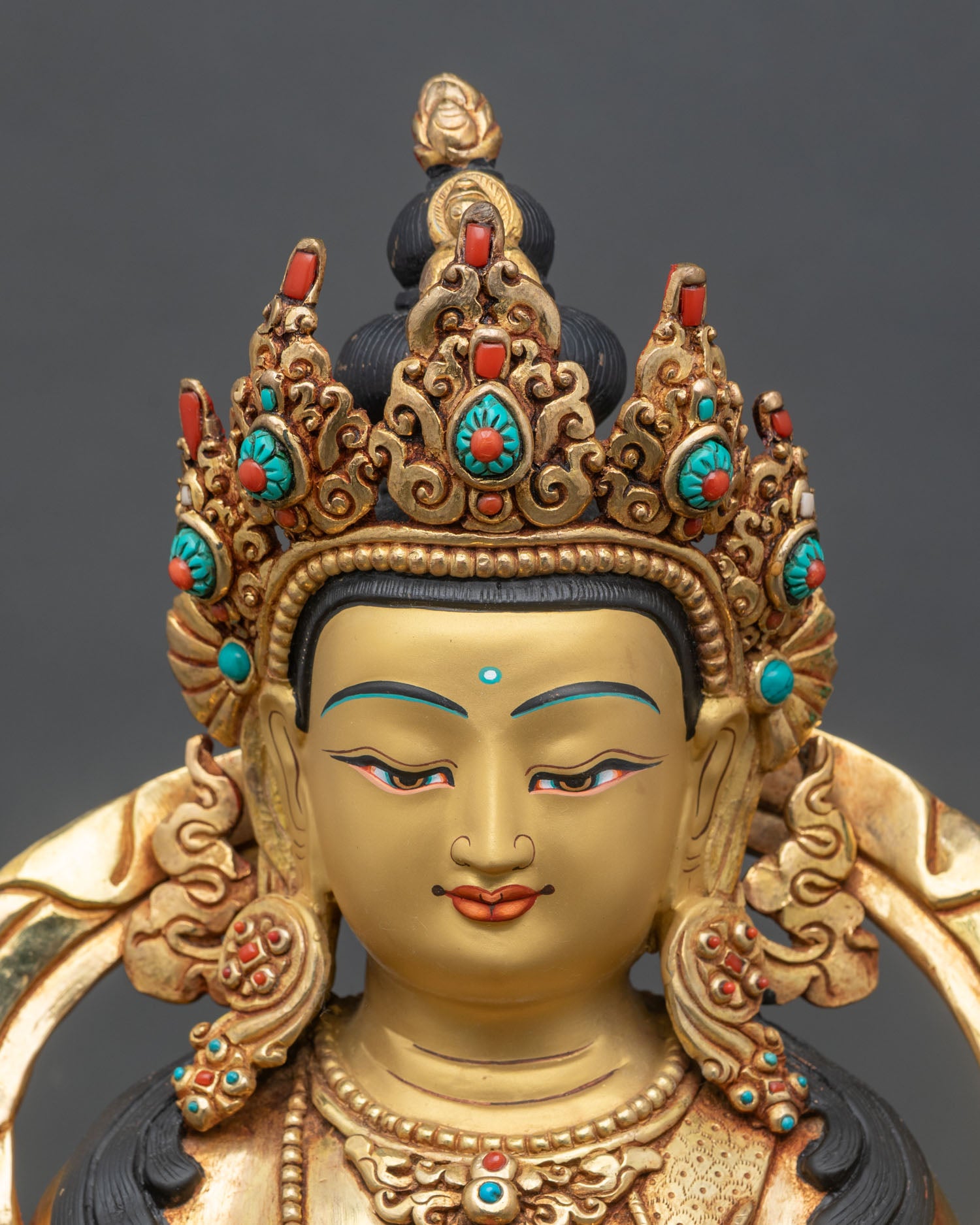 Chenrezig statue regular close up showing copper body and gold details