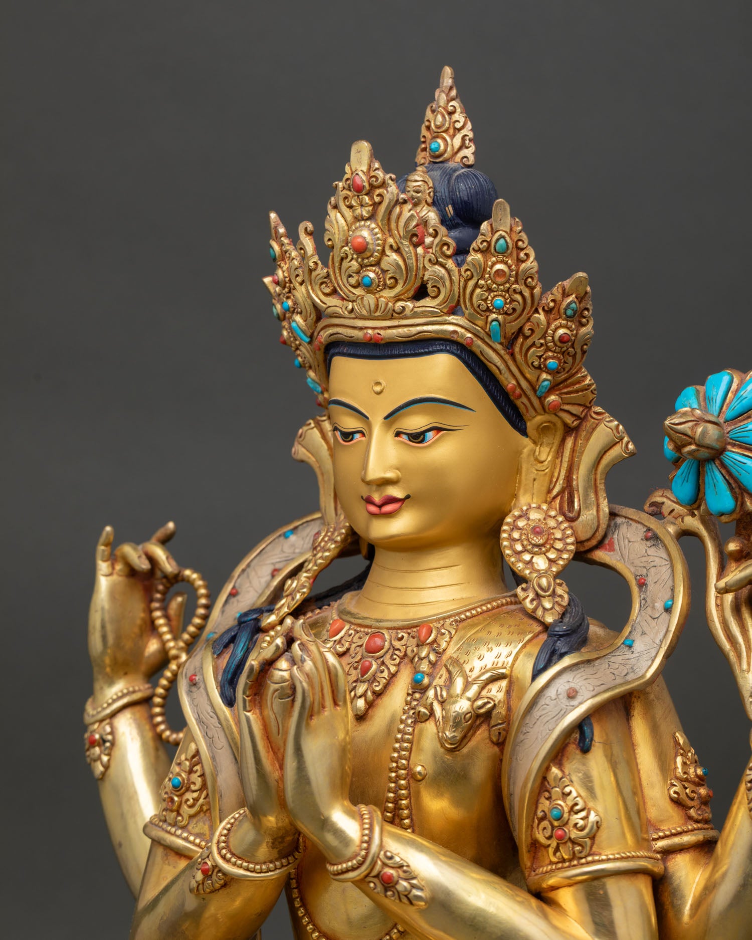 Chenrezig Statue Side Face with Gold Paint and Turquoise Inlay