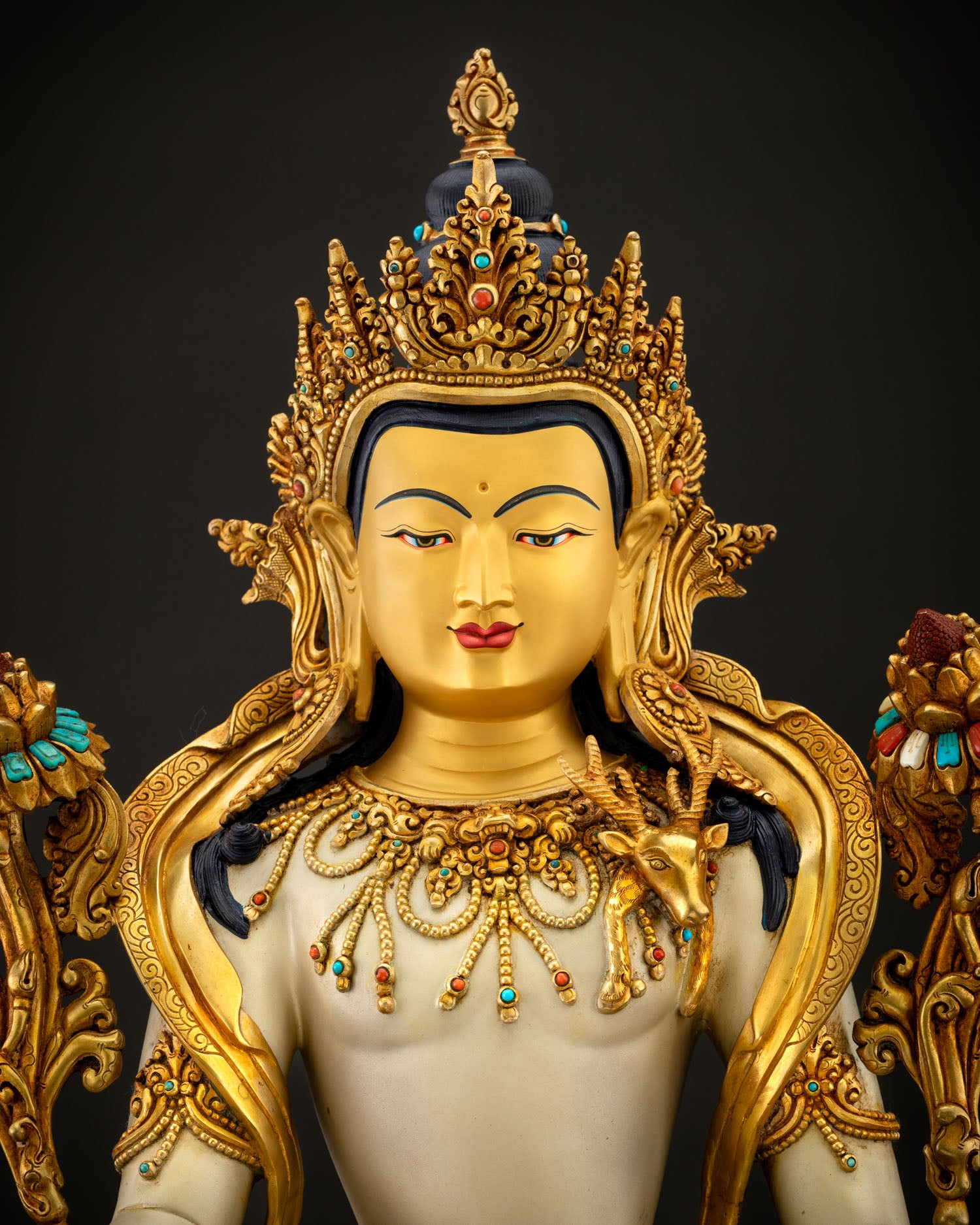Chenrezig Statue upper body detail showing white acrylic body and gold ornaments, Nepal