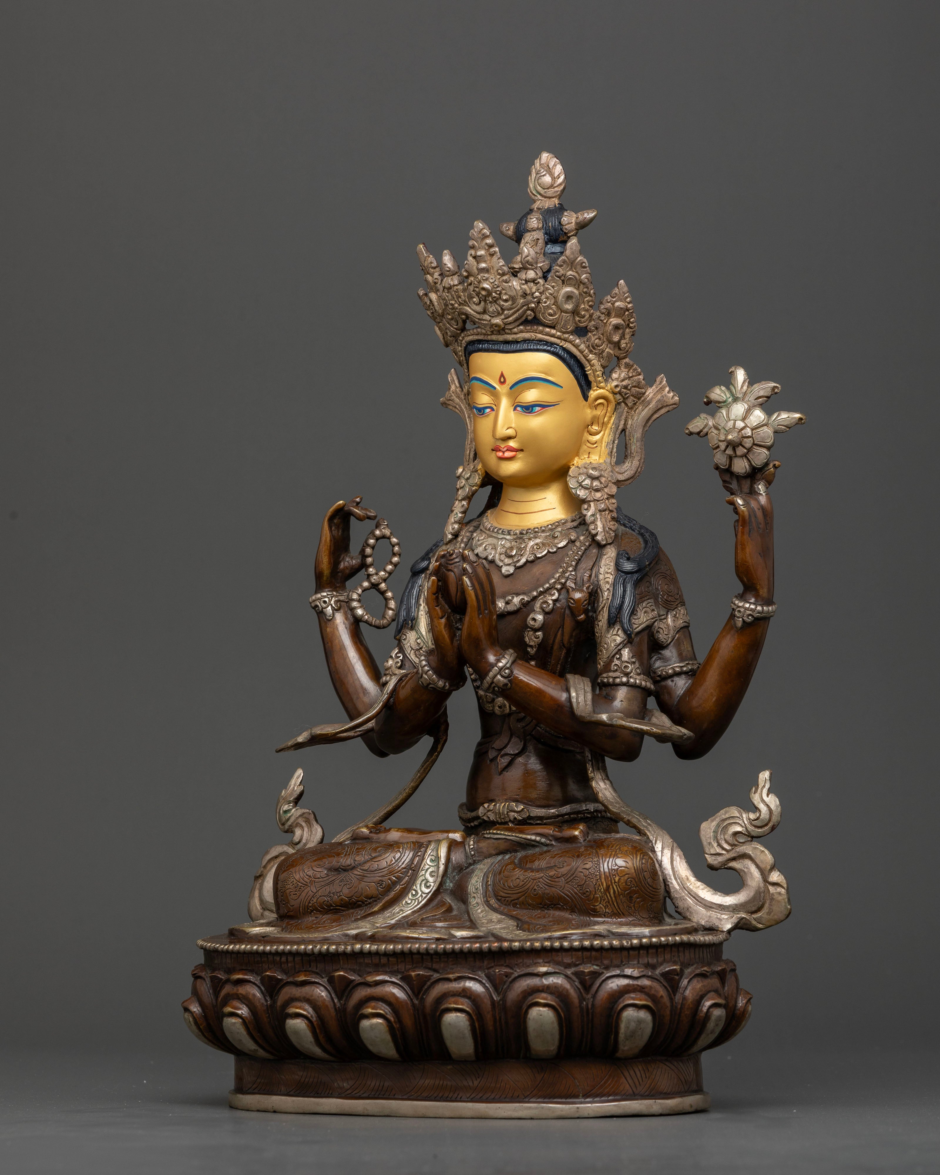 Chenrezig statue with serene face and intricate floral motifs