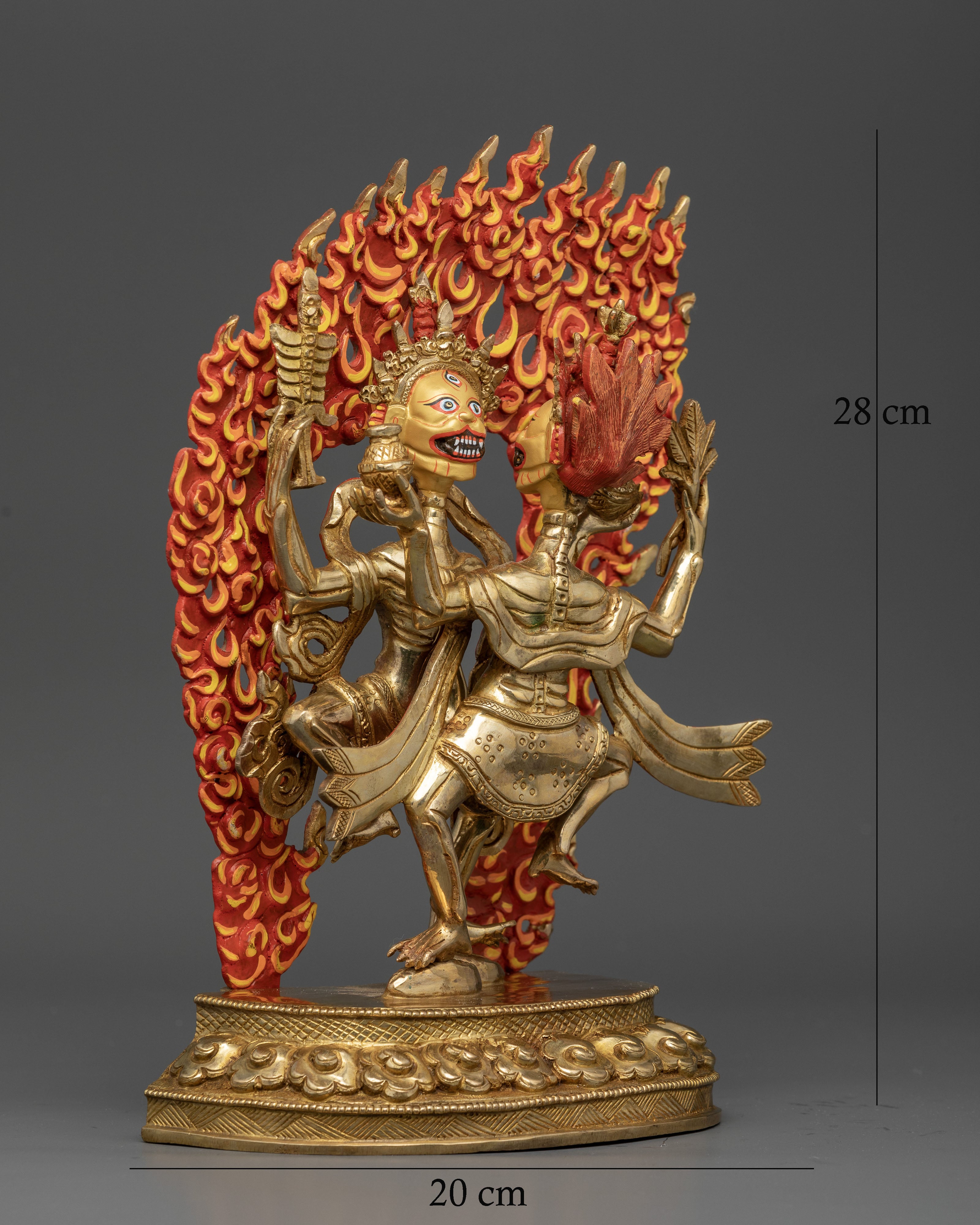 Citipati skeleton deities holding skull cup and staff in dancing pose.