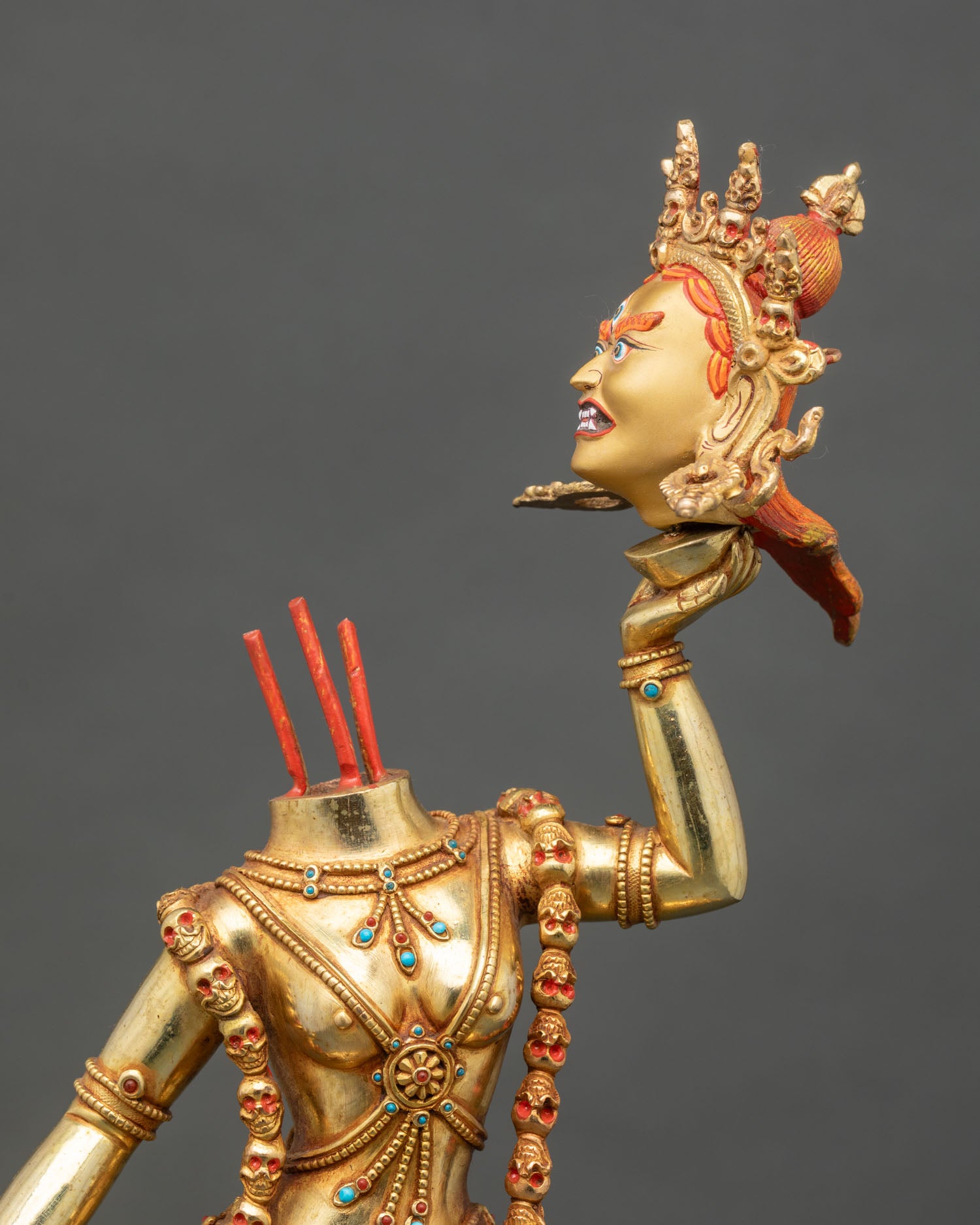 close up Vajrayogini Ucheyema statue severed head skull cup bone ornaments tantric dakini