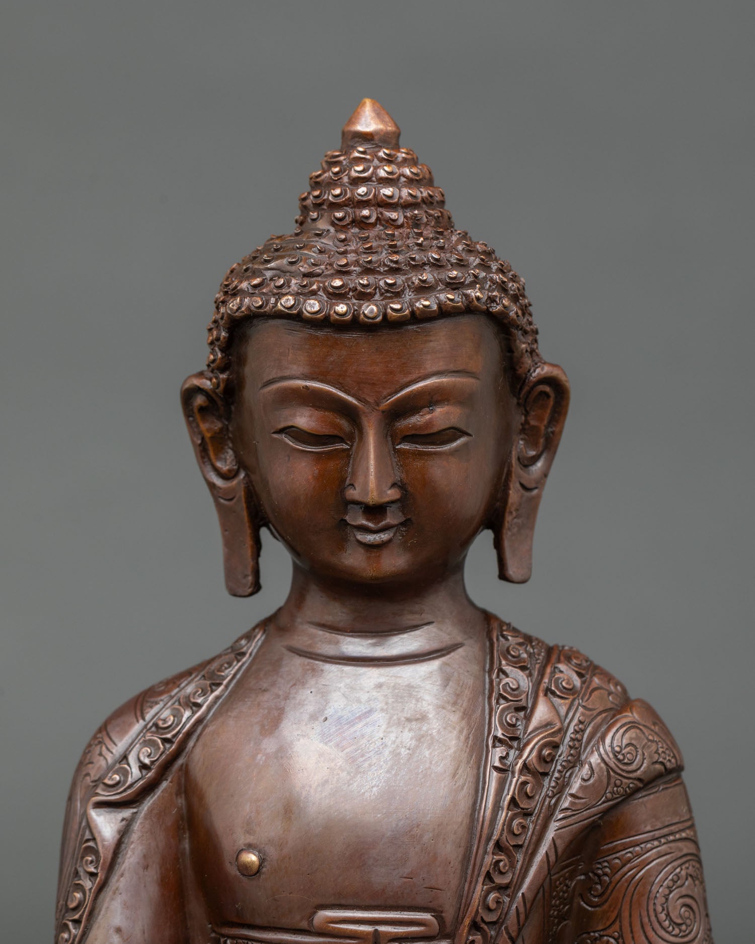 Close up Buddha face serene expression lotus throne Nepalese handcrafted art
