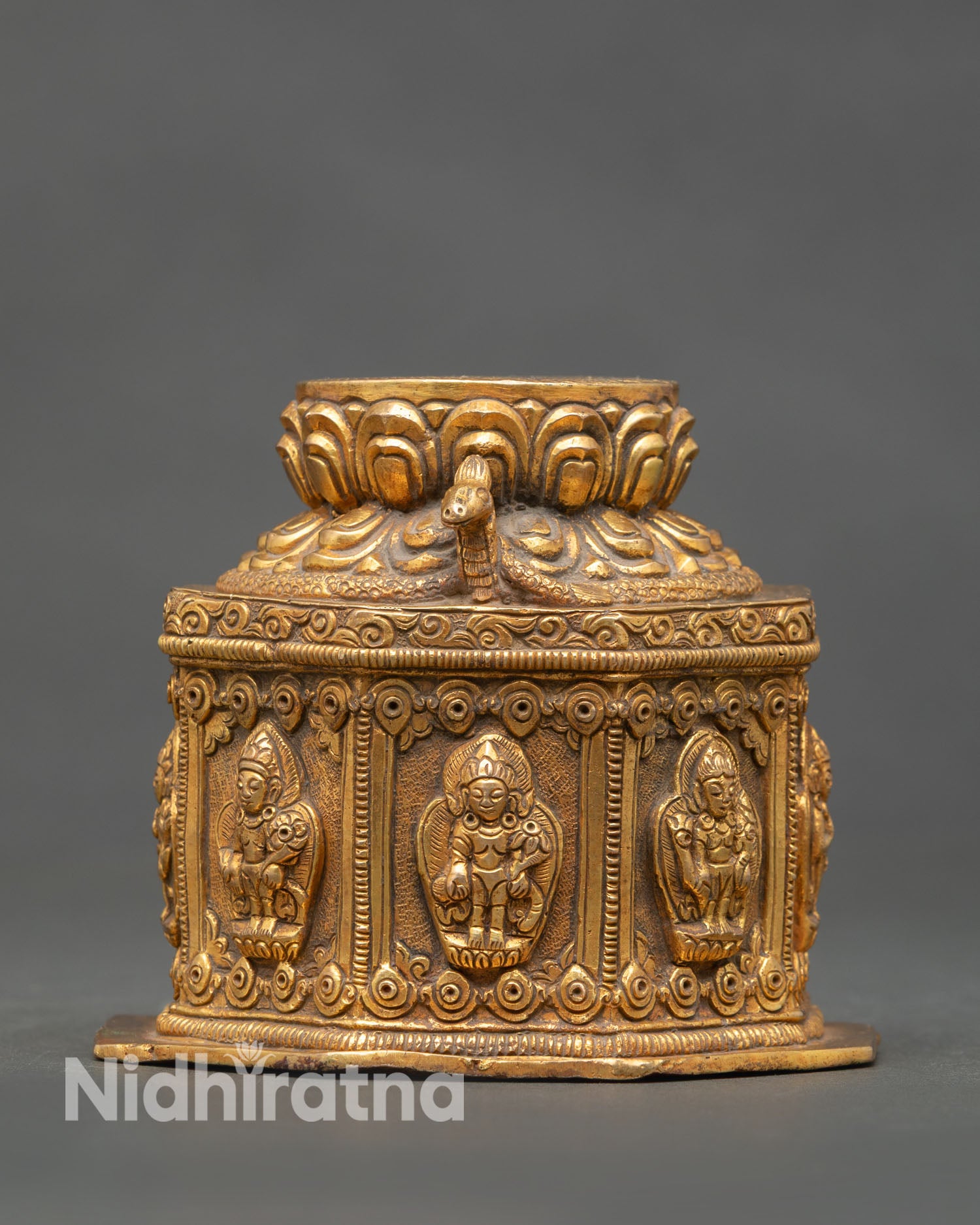 Close up view of Dharma Dhatu made with copper core and radiant gold accents symbolizing awakened awareness and ultimate Buddhist truth.