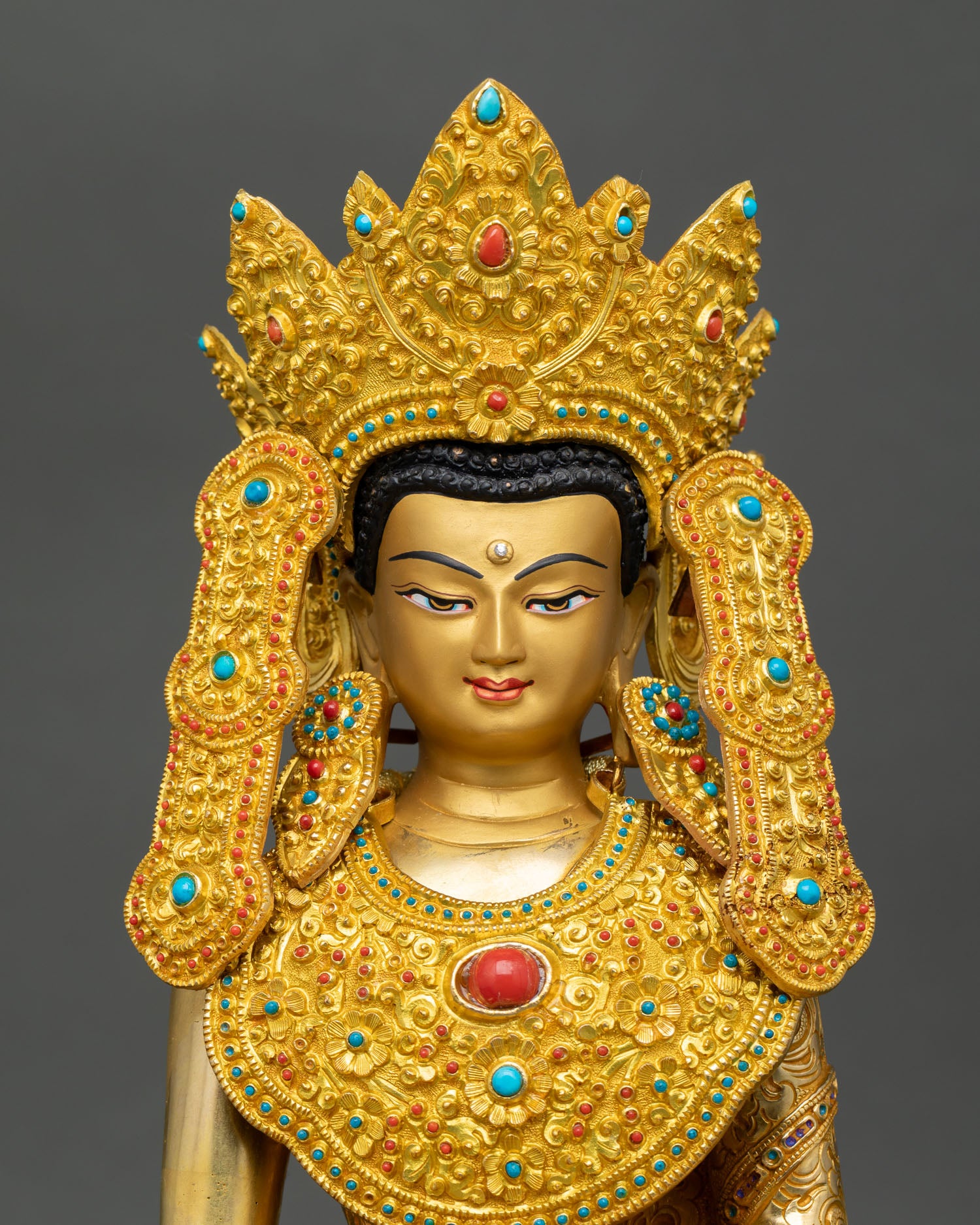 Close up Jowo Rinpoche Shakyamuni Buddha statue with Five Buddha crown, semi precious stones and intricate 3D detailing and ornaments