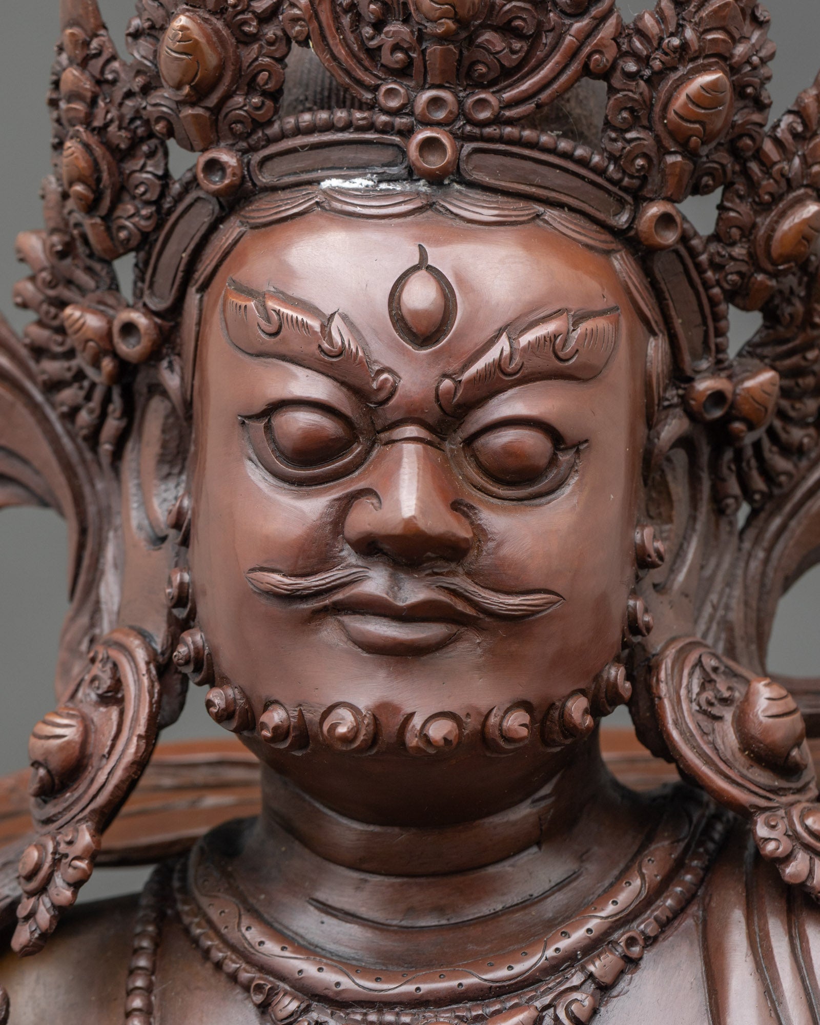 Close up Namtoshe face wrathful expression sculpture