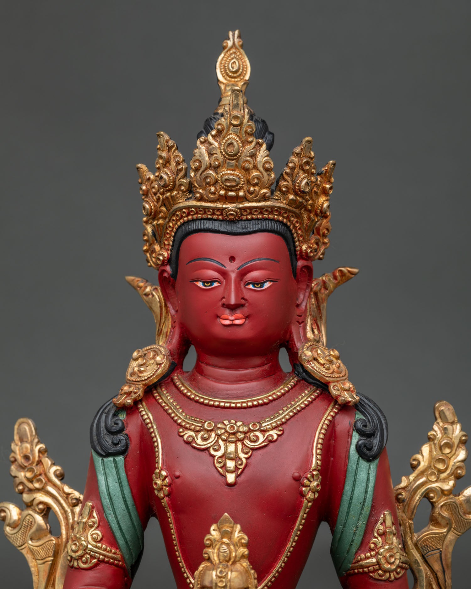Close-up of Amitayus Statue showing gold-gilded crown, jewelry and dhyana mudra hands