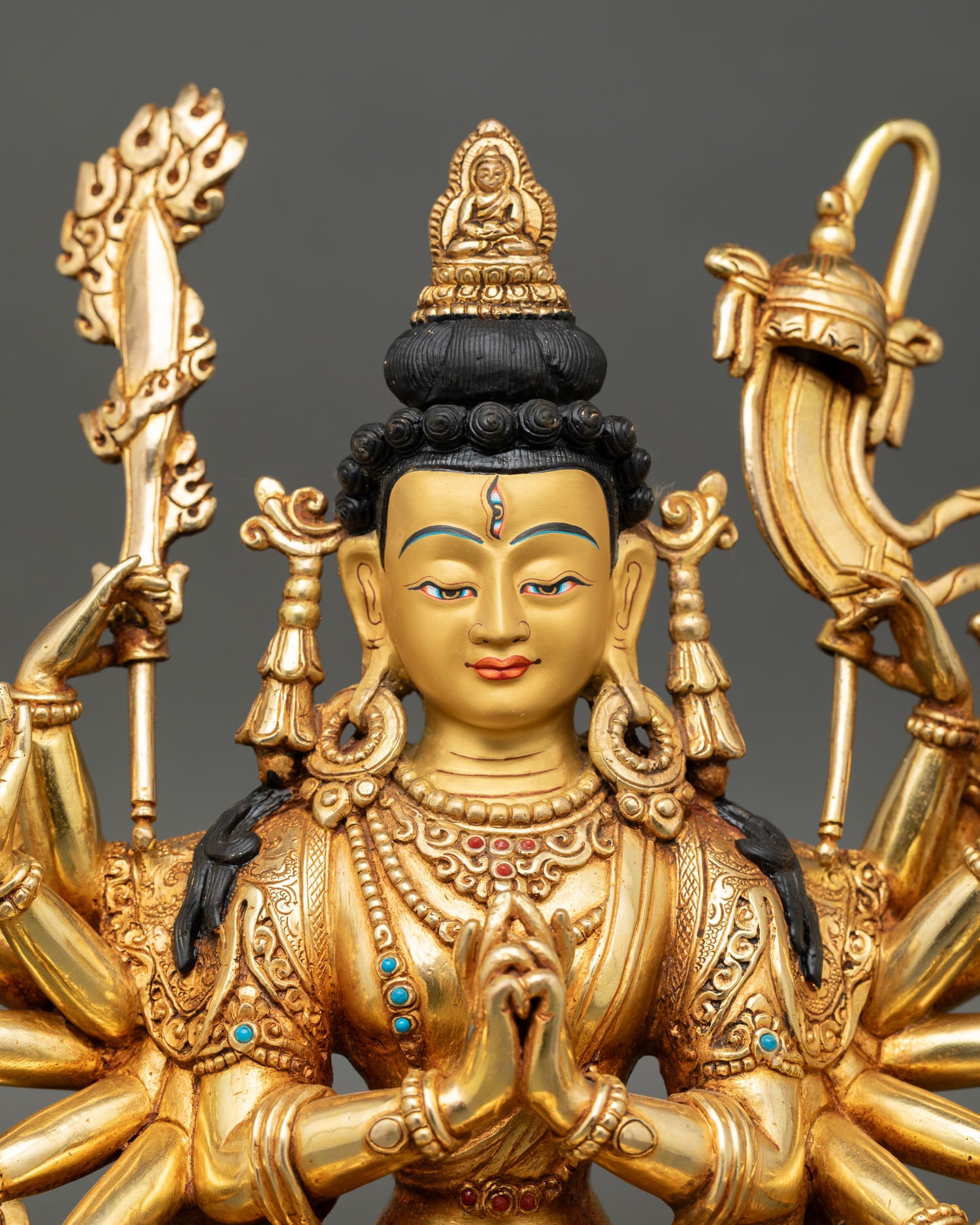 Close up of Chundi Devi statue, jeweled crown, Amitabha Buddha sacred implements, handcrafted in Nepal