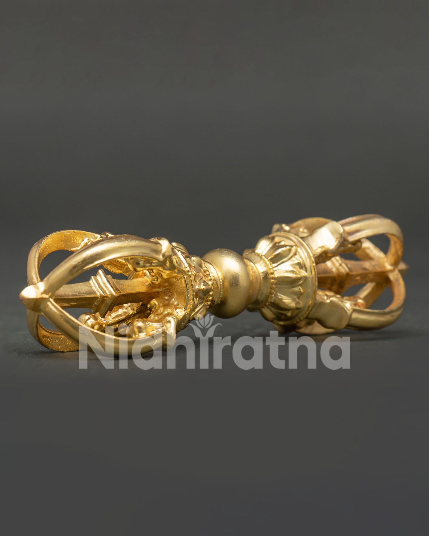 Close Up of Copper Vajra with Intricate Gold Plated Details