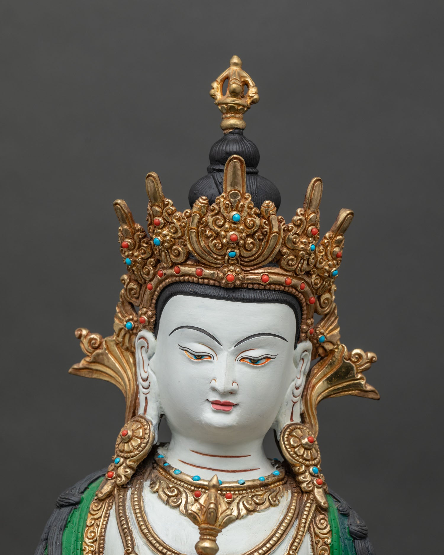 Close-up of Dorje Sempa's hands holding a vajra and bell