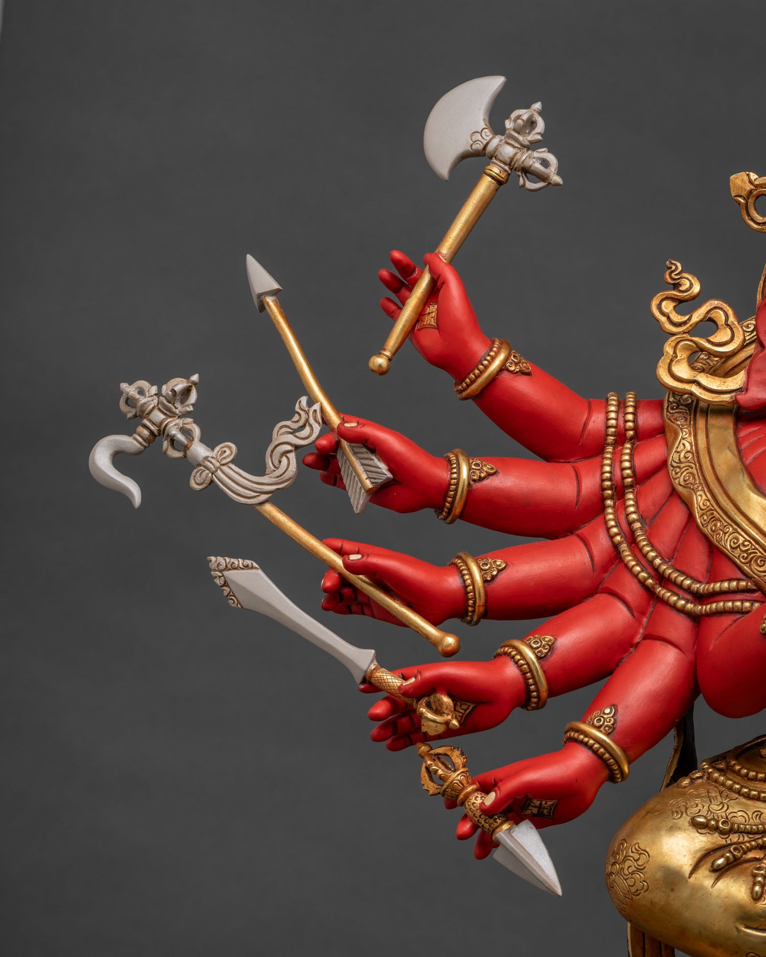 Close-Up of Ganapati Idol's Right Arms Holding Sacred Ritual Attributes
