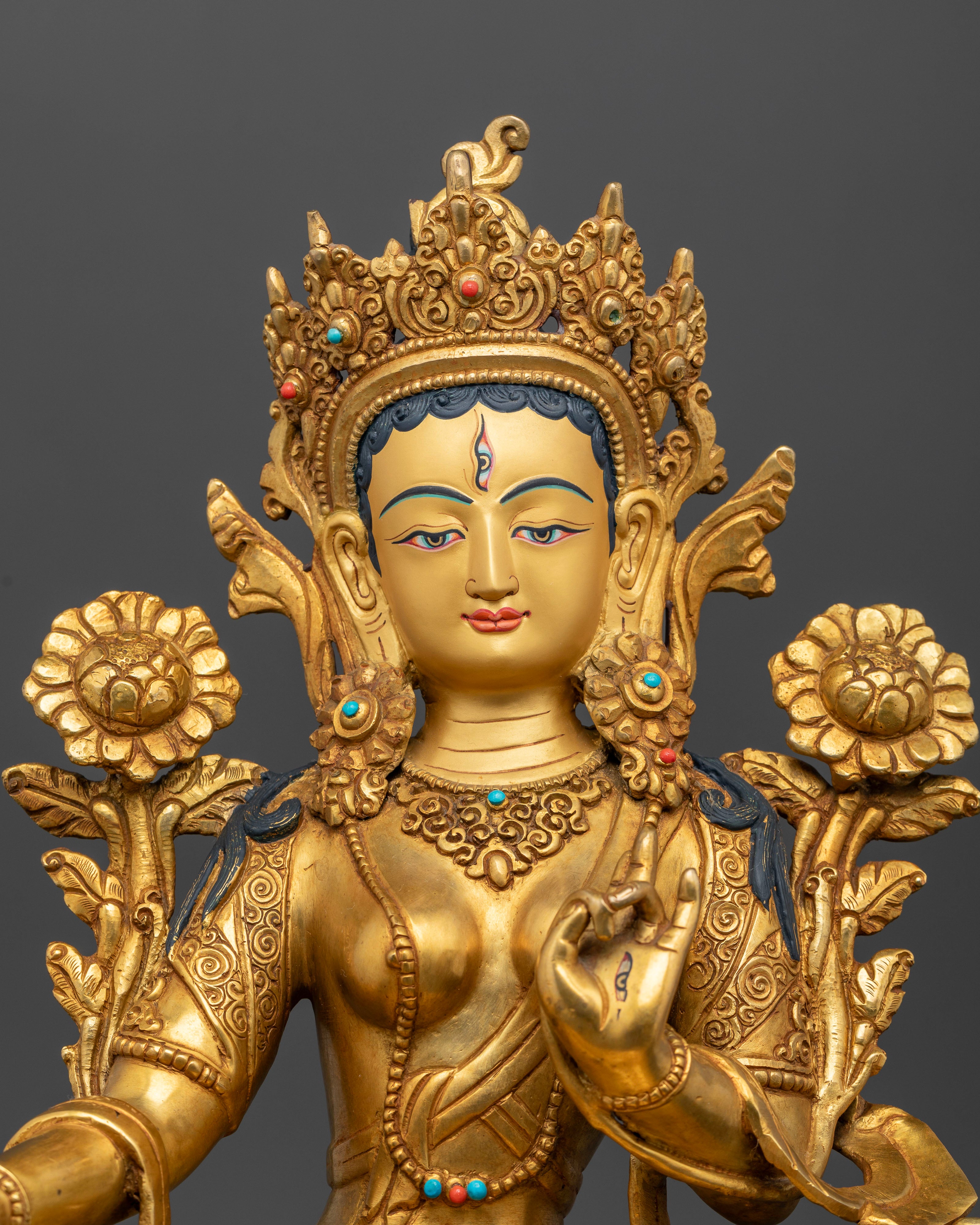 Close up of Handcrafted White Tara Statue with turquoise and coral stone details