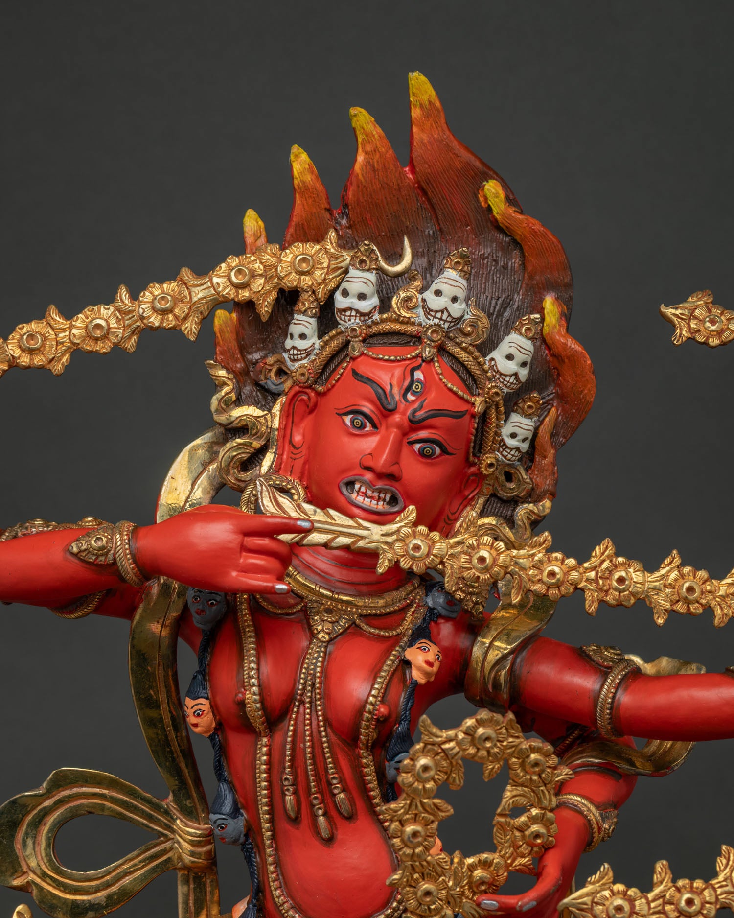 Close up of Kurukulla Statue, hand-painted in vibrant acrylic colors with semi-precious stones