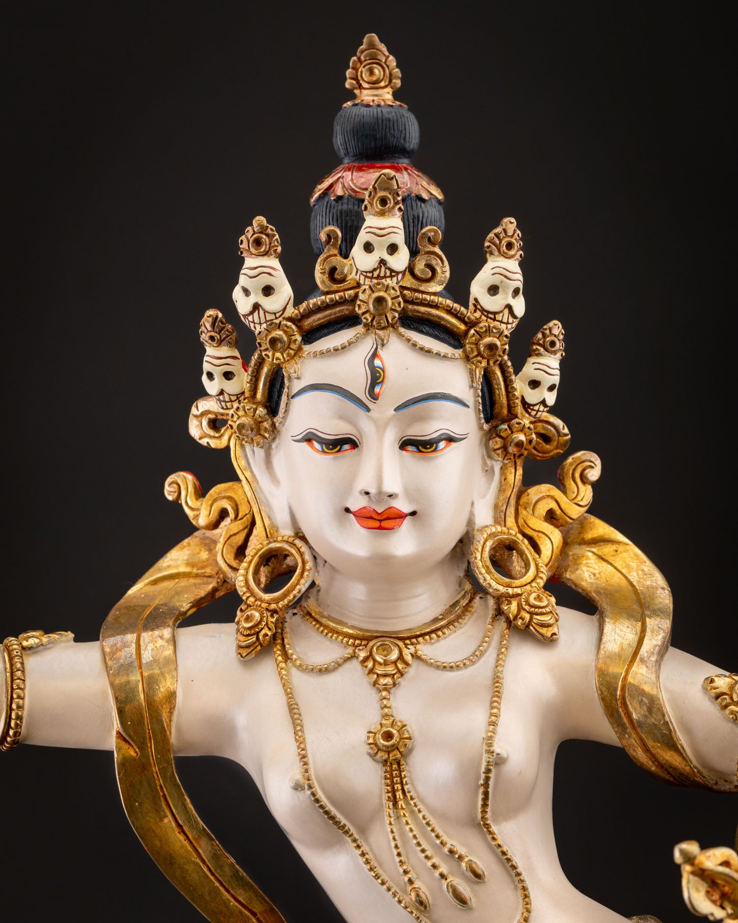 Close-up of Machig Labdron Statue with skull crown and gold-gilded ornaments