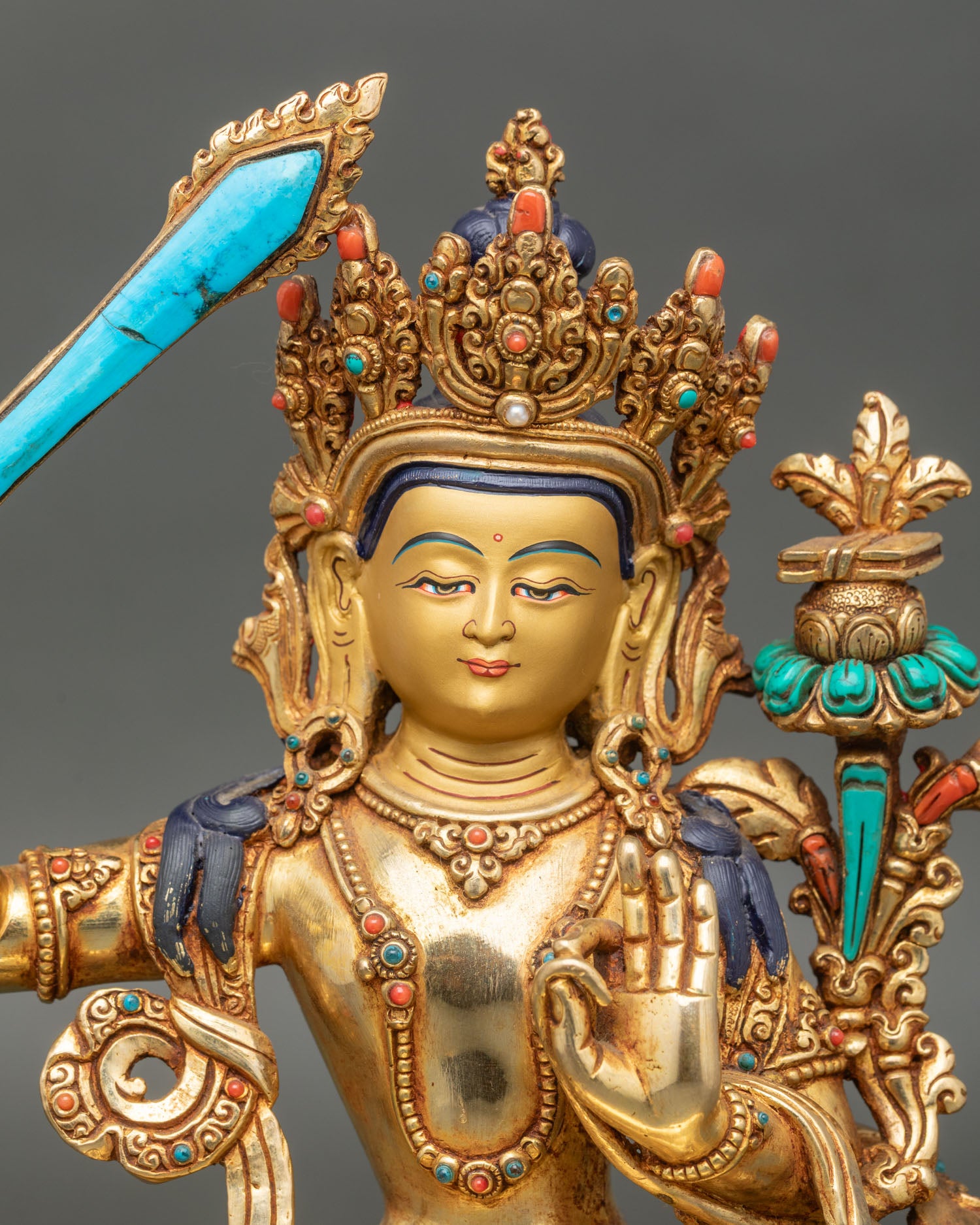 Close up of manjushri serene face flaming sword prajnaparamita scripture enlightenment decor