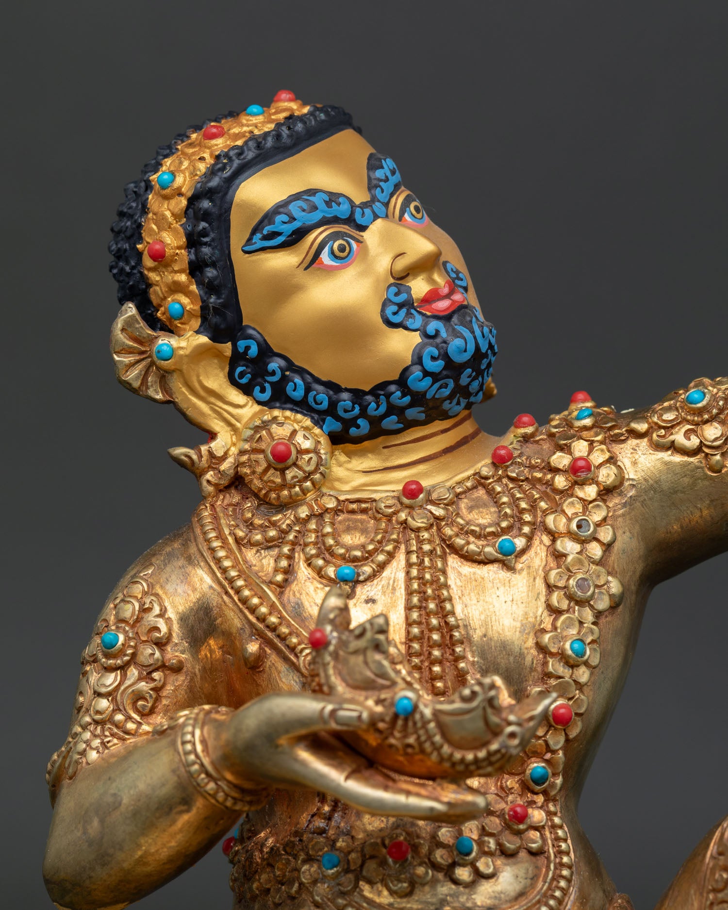 Close-up of Virupa Statue showcasing gold-gilded ornaments and traditional Newari craftsmanship