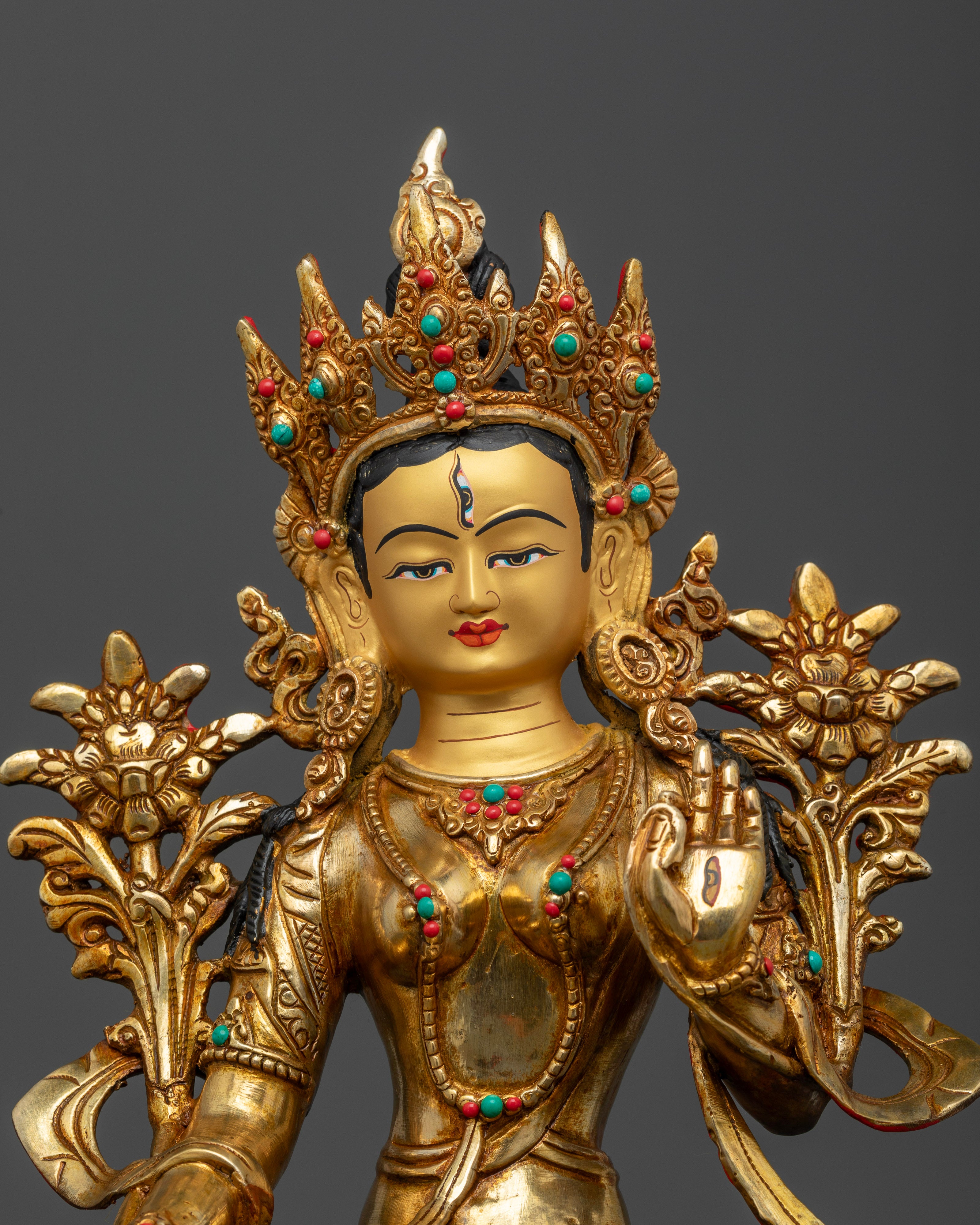 Close Up of White Tara Statue with Gold Painted Face and Semi Precious Stones