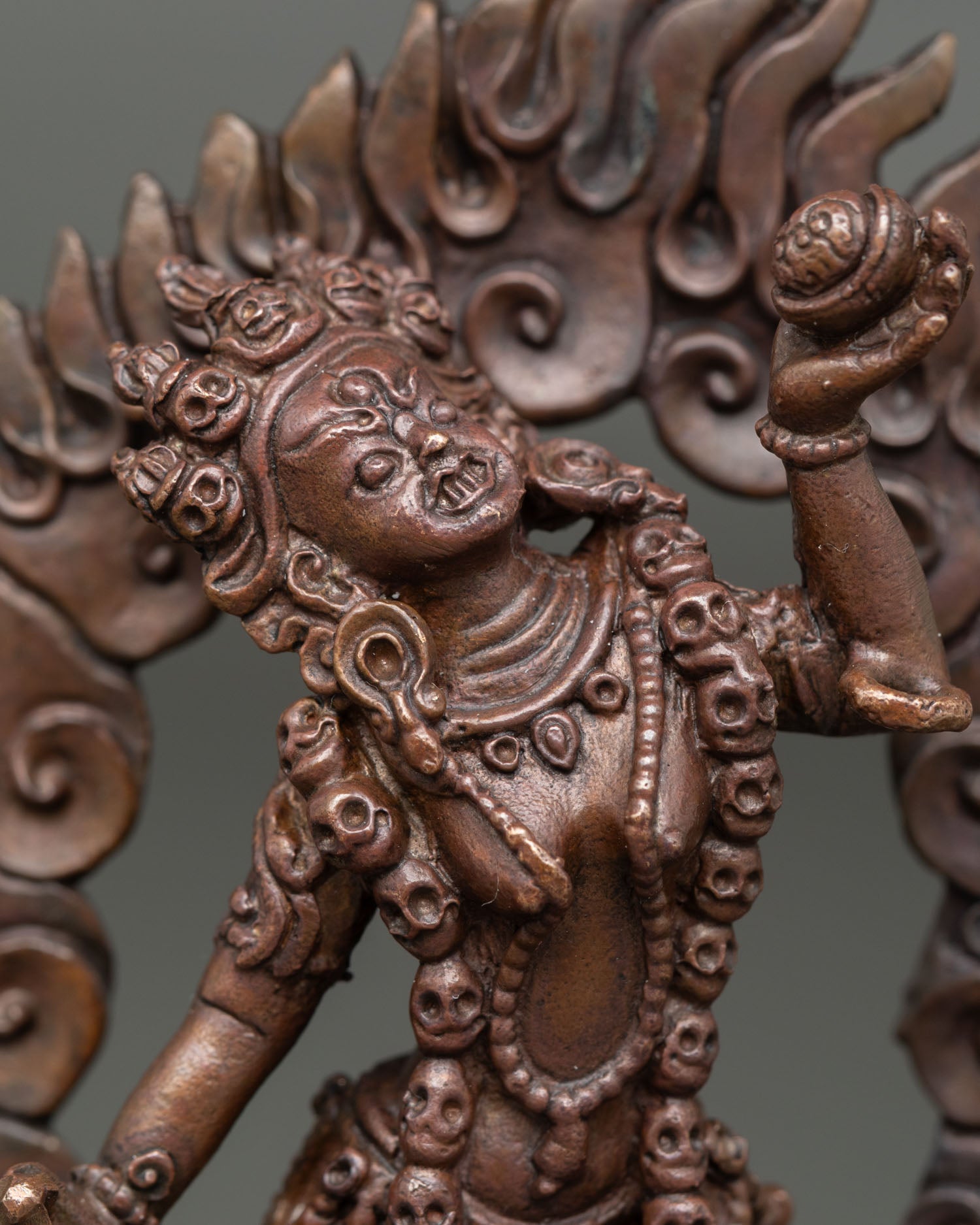 Close up view of Vajrayogini face showing tantric dakini expression with Himalayan Newari craftsmanship details