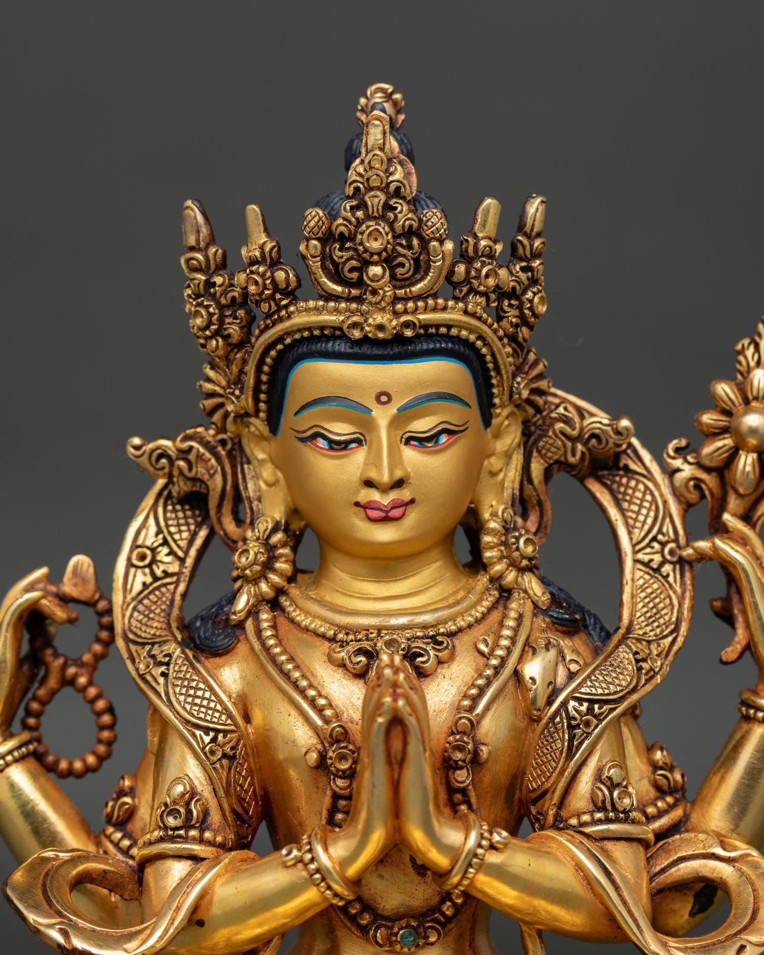 Chenrezig statue fire-gilded copper detail craftsmanship Buddhist art Nepal
