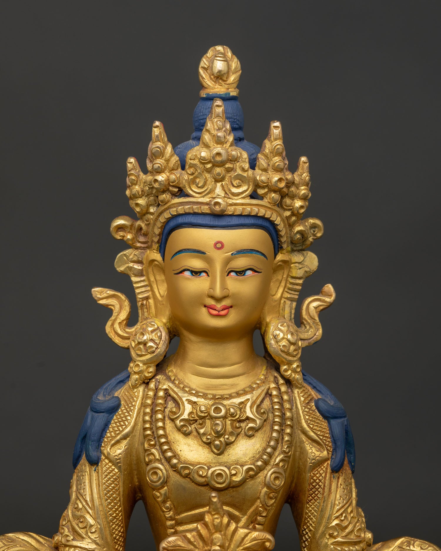 Close up view of Amitayus, holding sacred vase with nectar of immortality
