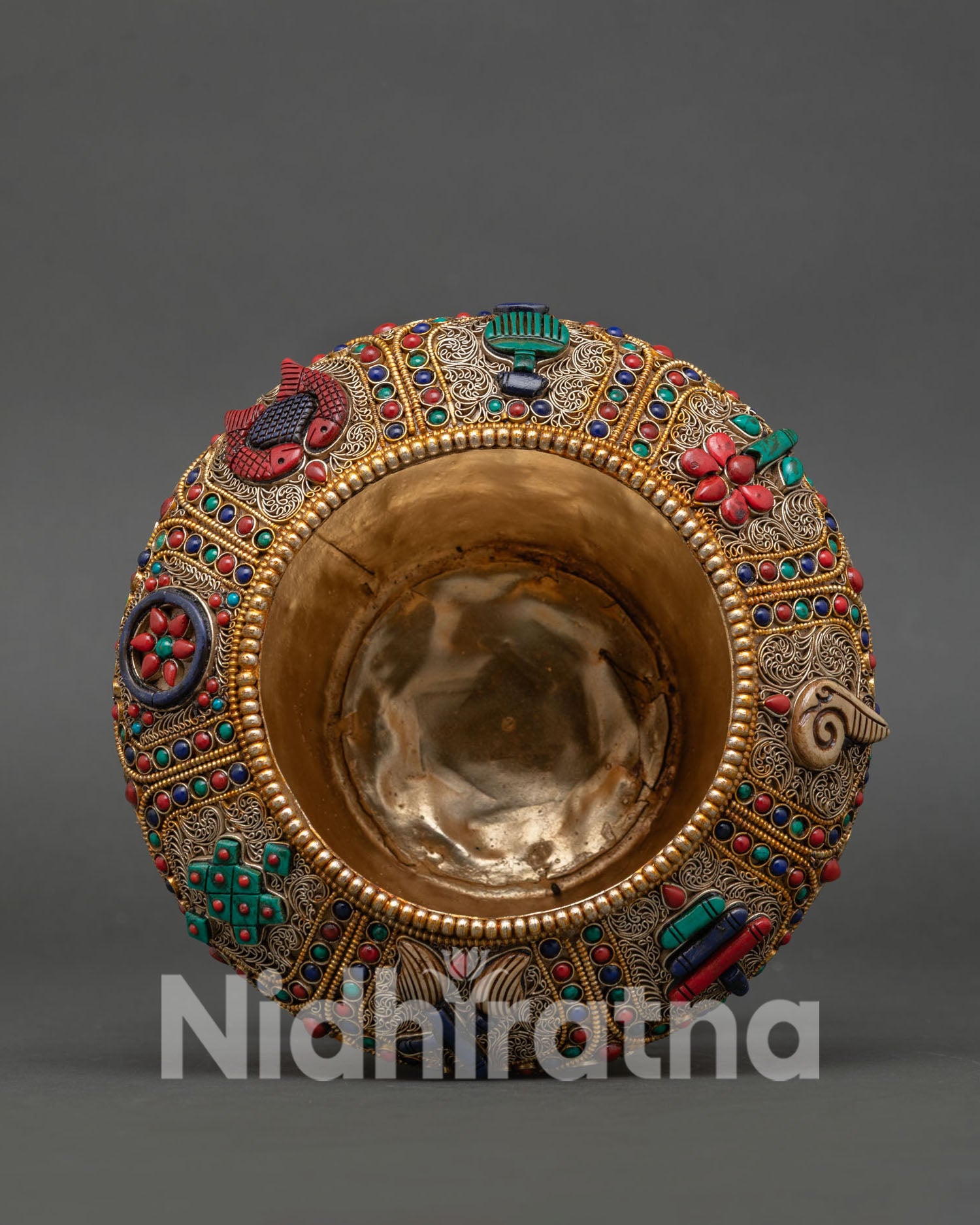 Close Up View of Sacred Rice Pot Featuring Intricate Filigree Art, and Buddhist Auspicious Symbols