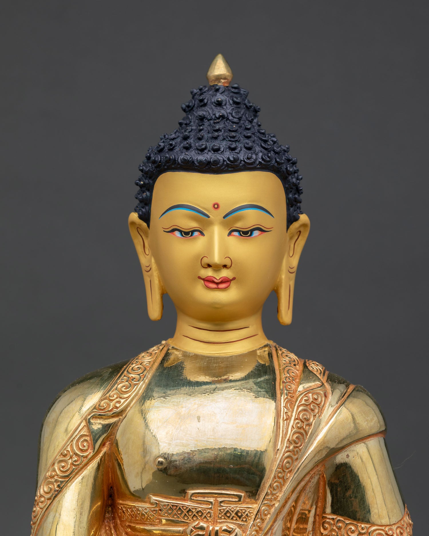 Close up view of Shakyamuni Buddha statue with calm expression symbolizing wisdom inner peace and enlightened awareness