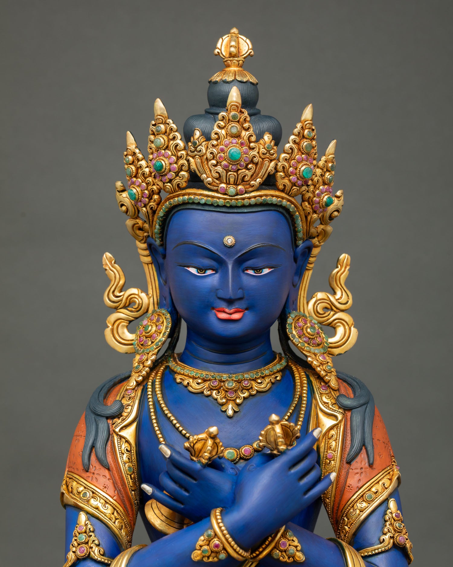 Close up view of Vajradhara Statue showing intricate copper carving and ornaments