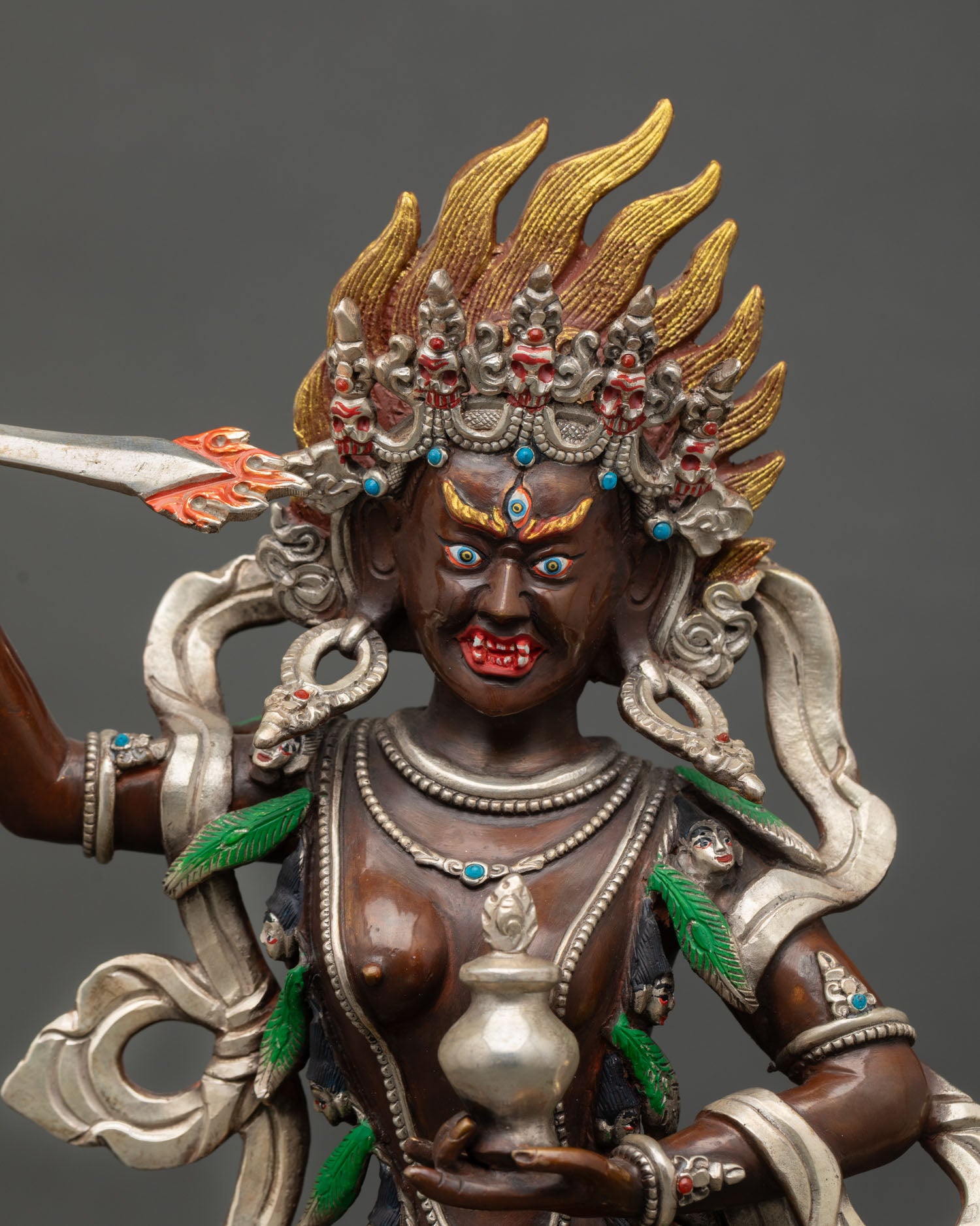 Close up Yeshe Walmo face, hand-painted acrylic, semi-precious stones, copper statue, Nepal