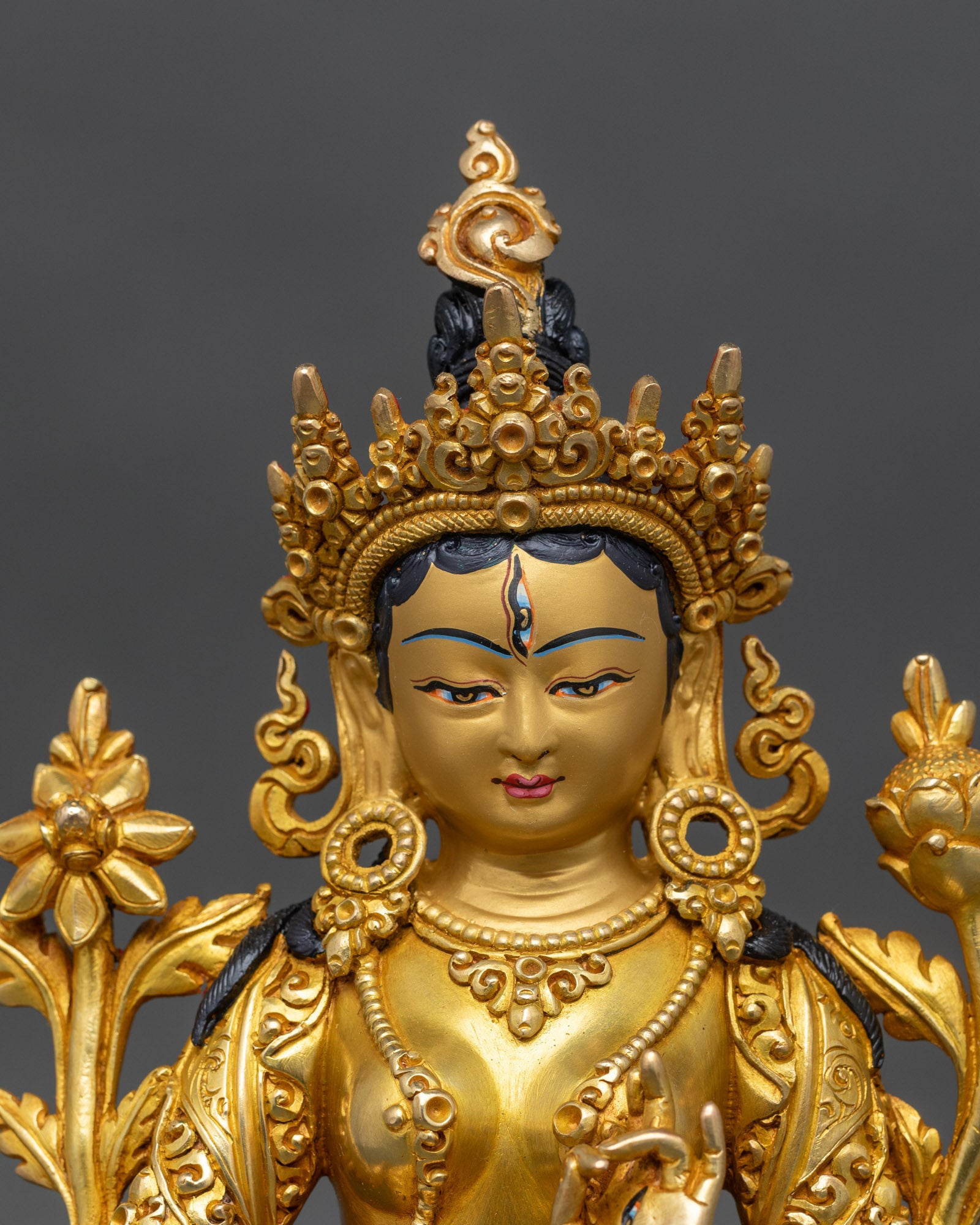 close-up-white-tara-face-gold-painted-lotus-handcrafted-nepal-buddhist-deity