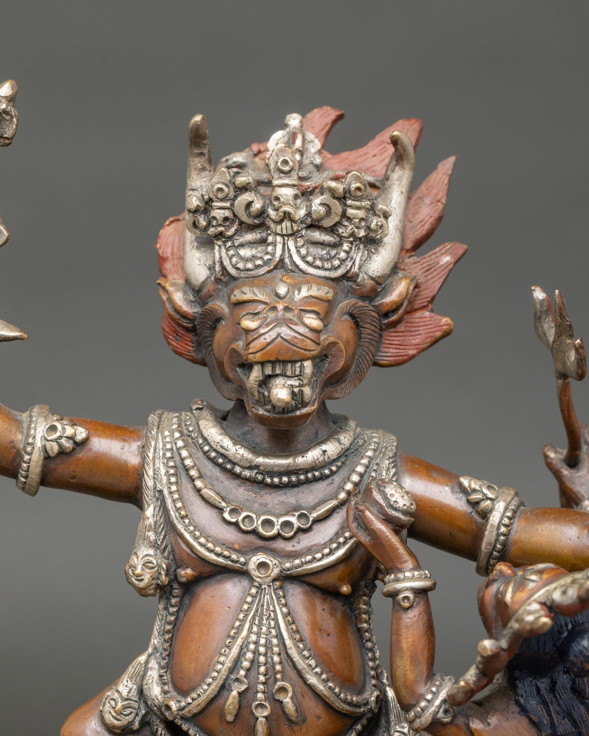 close-up-yamantaka-face-wrathful-expression-consort-lotus-seat-tantric-sculpture