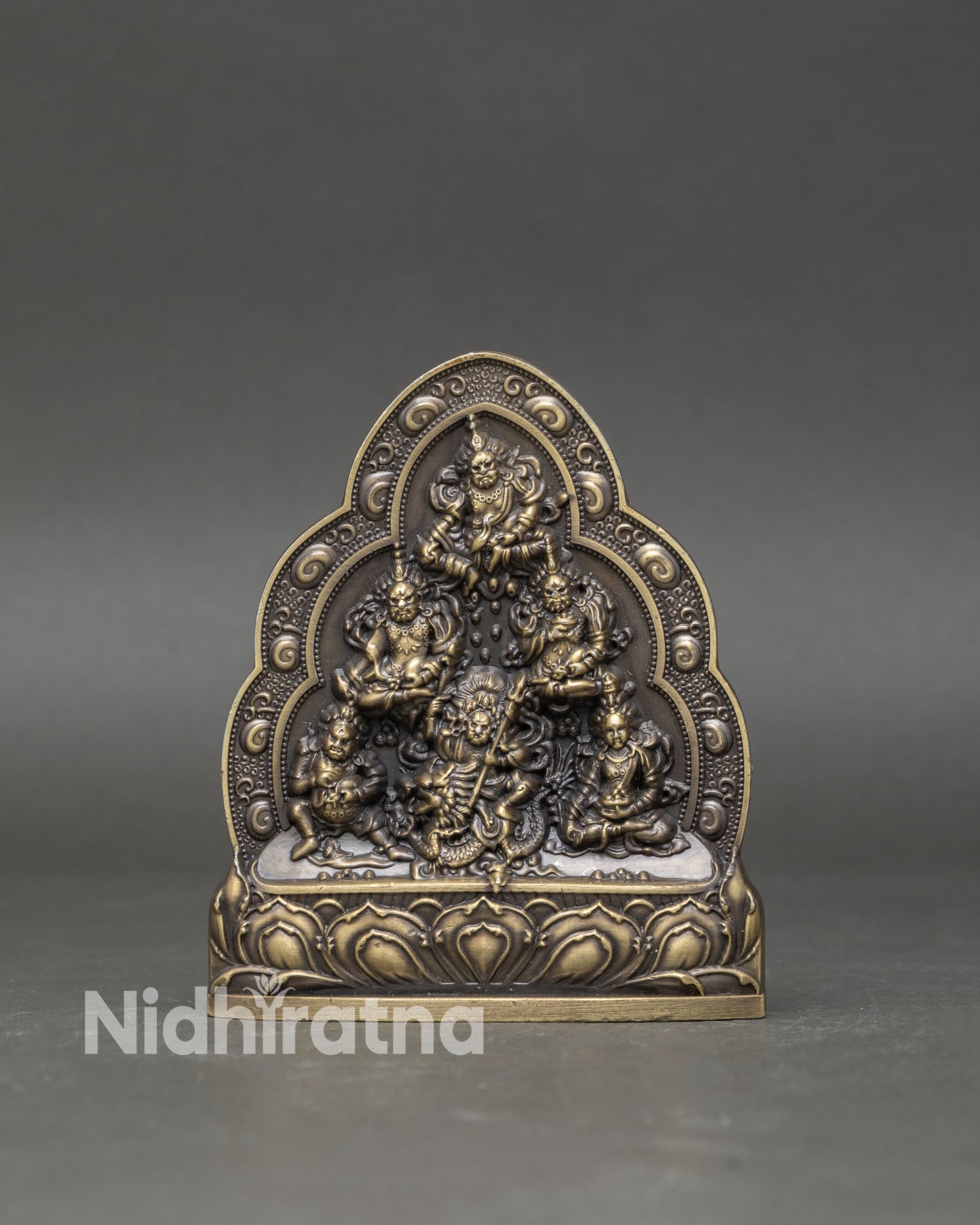 Close up Yellow White Black Red Green Jambhala deities intricate relief copper