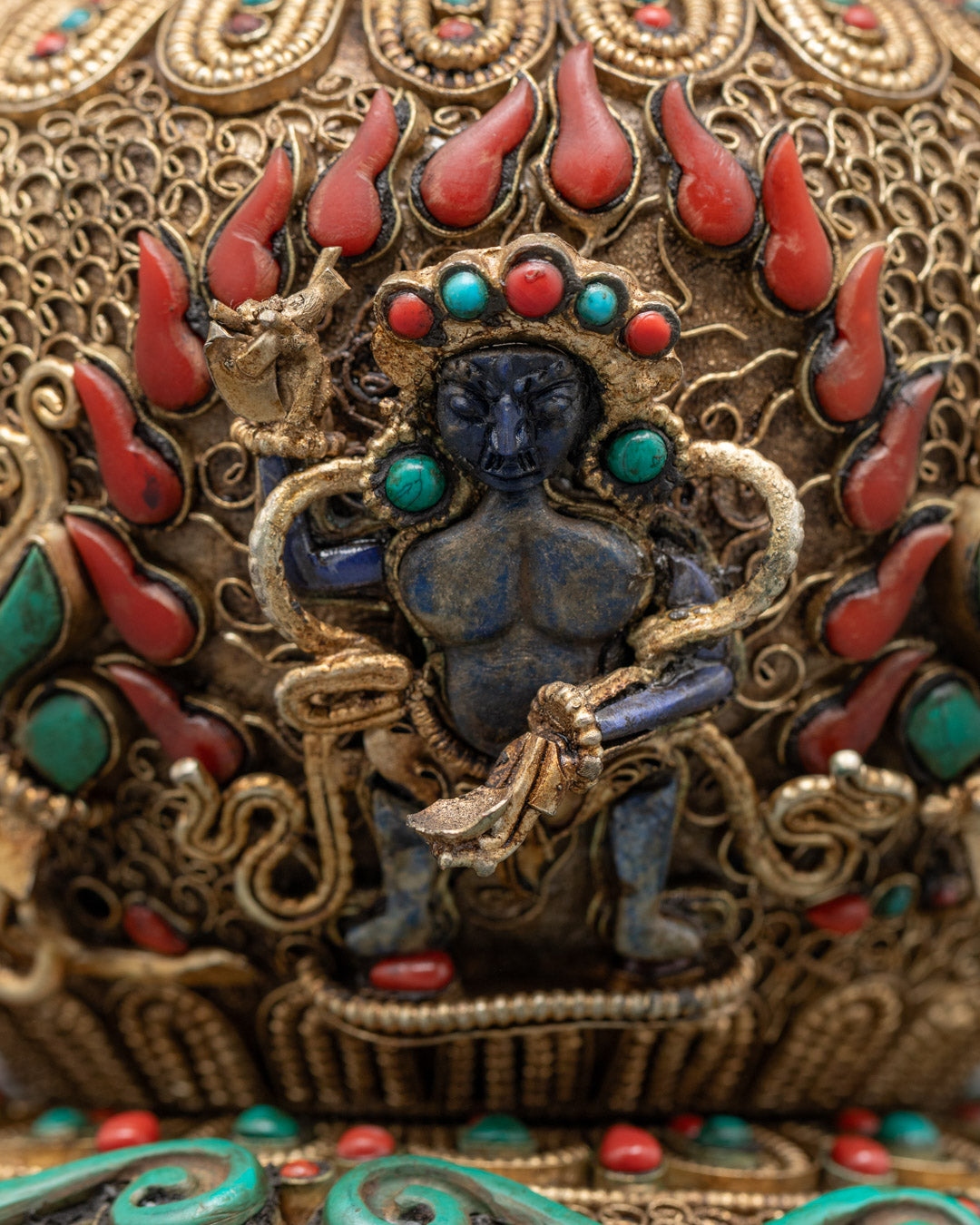 close-up of semi-precious stones on handcrafted tibetan rice bowl