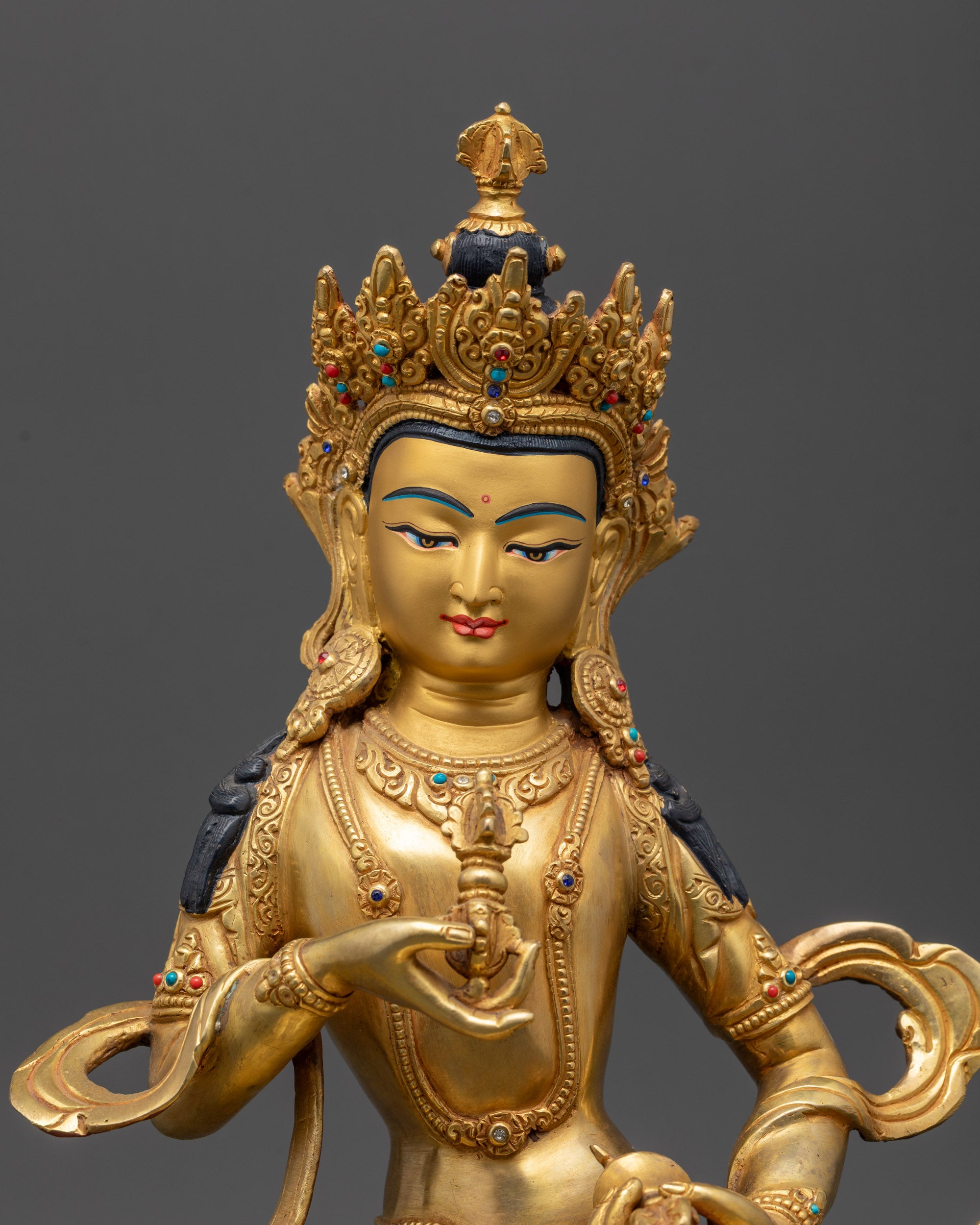close up Gold-Gilded Vajrasattva face, Five-Jeweled Crown and semi-precious stone details