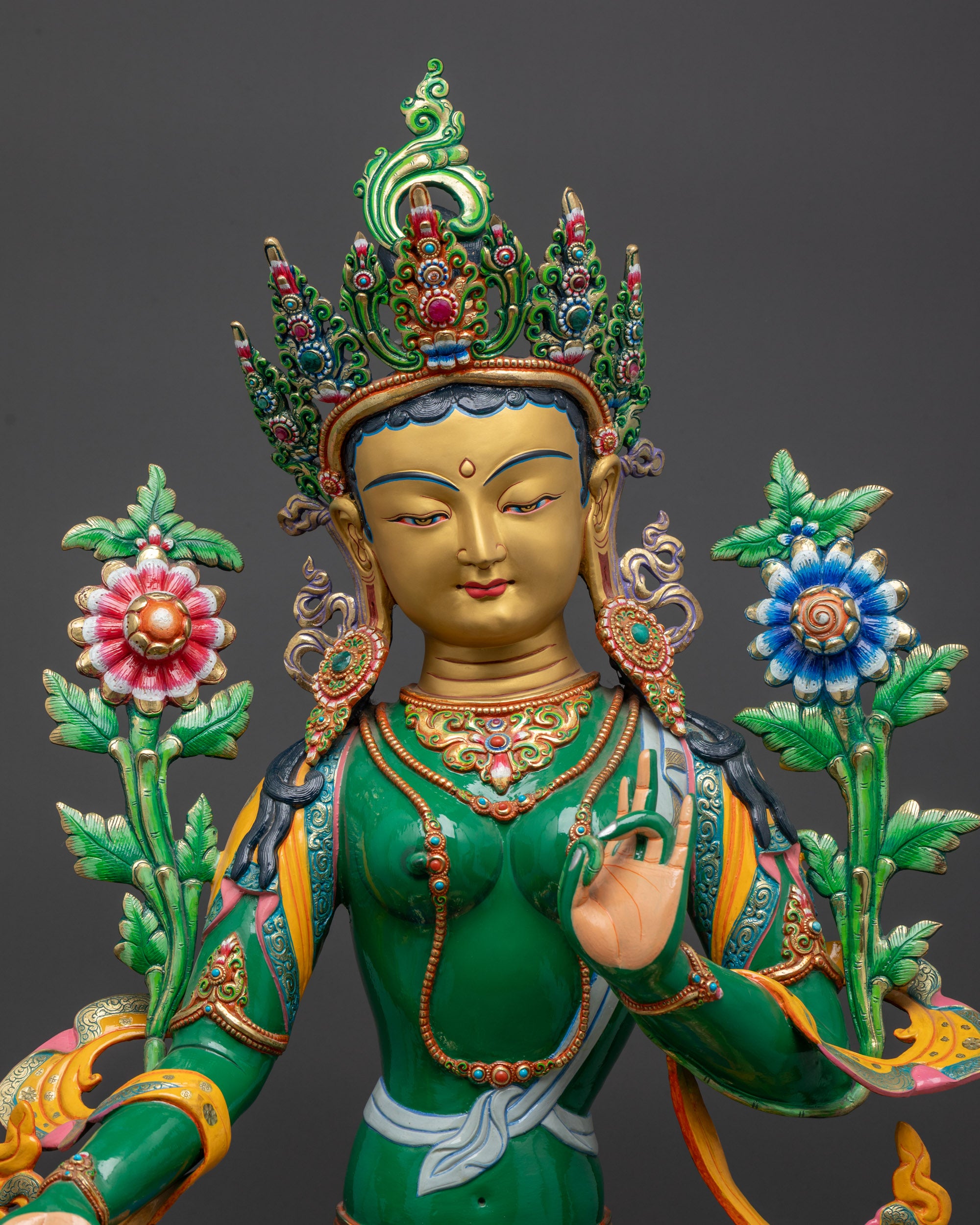 close up Green Tara Statue showing five-jeweled crown and flowing robes