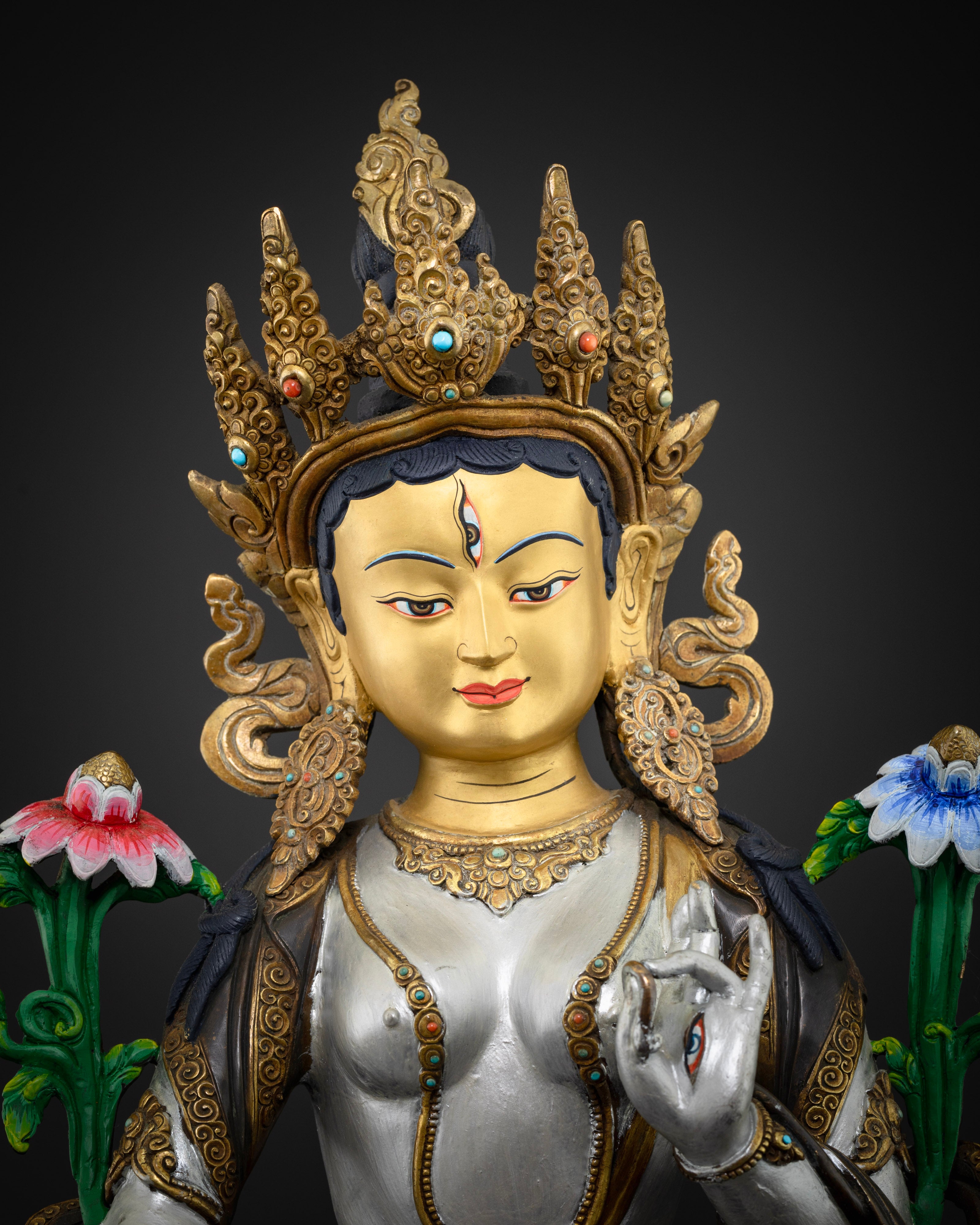 pure gold plated face of colorful white tara statue