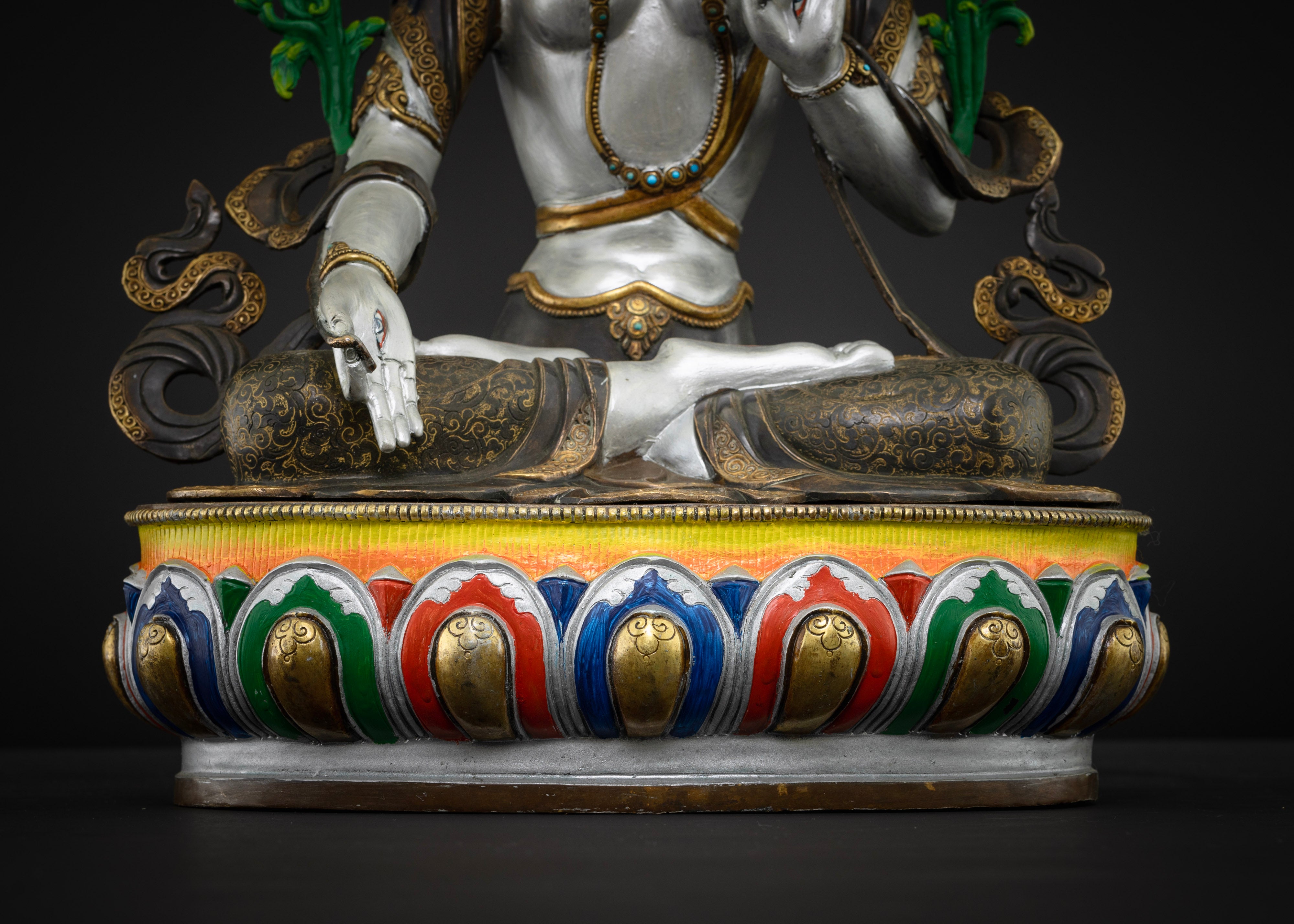 crossed legs of masterpiece colorful white tara statue