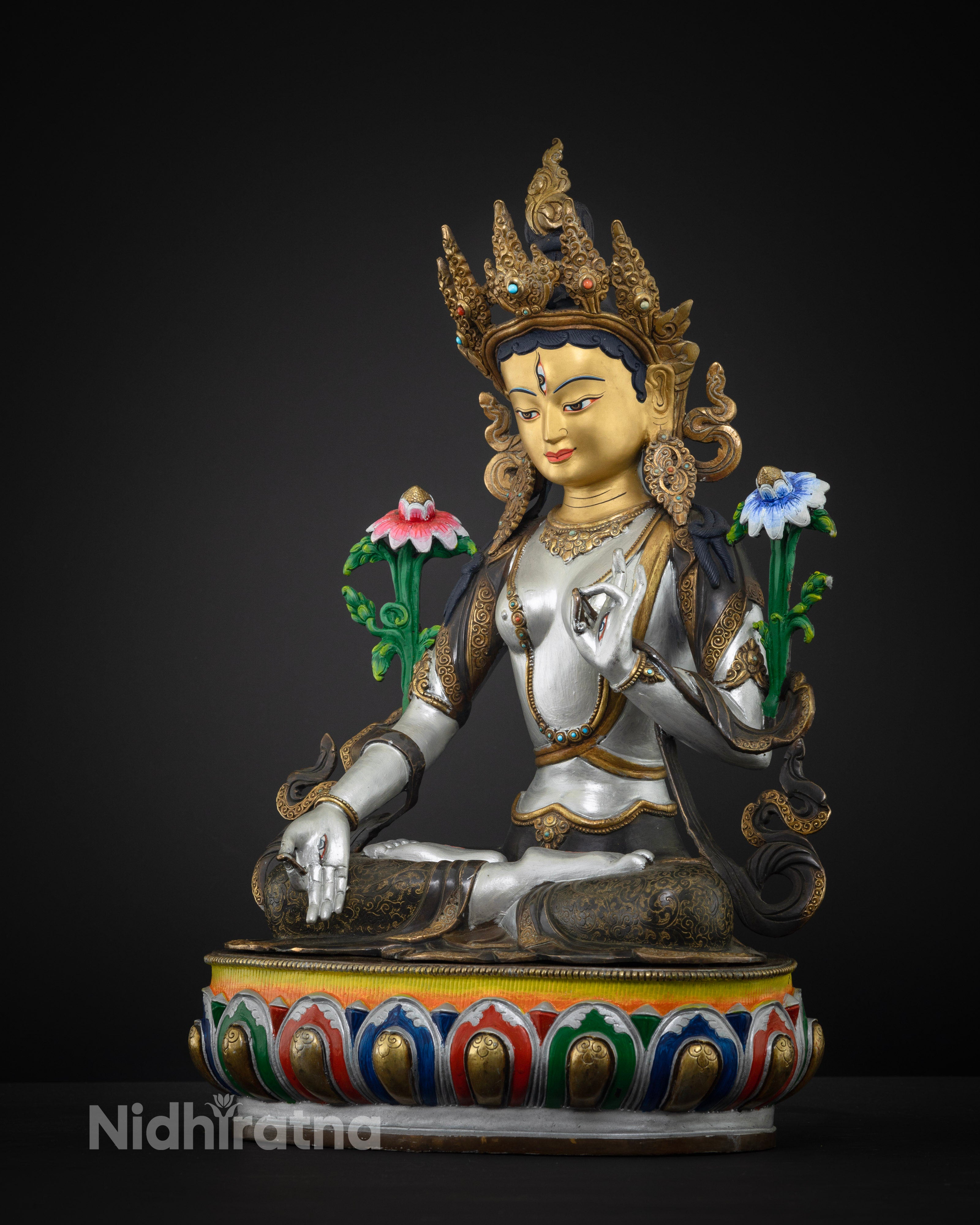side view of colorful white tara statue
