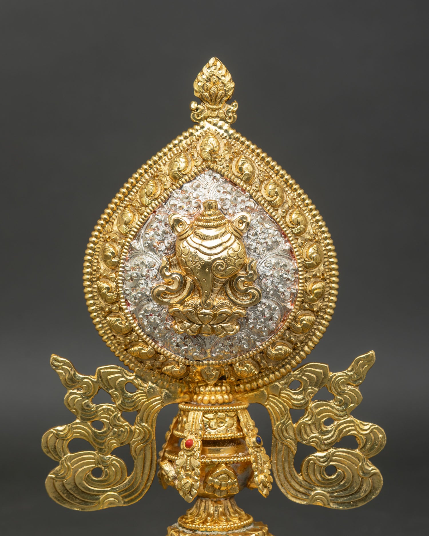 Conch Shell Astamangala symbol crafted in copper with gold and silver plated surface representing the sound of Dharma awakening and deep spiritual truth